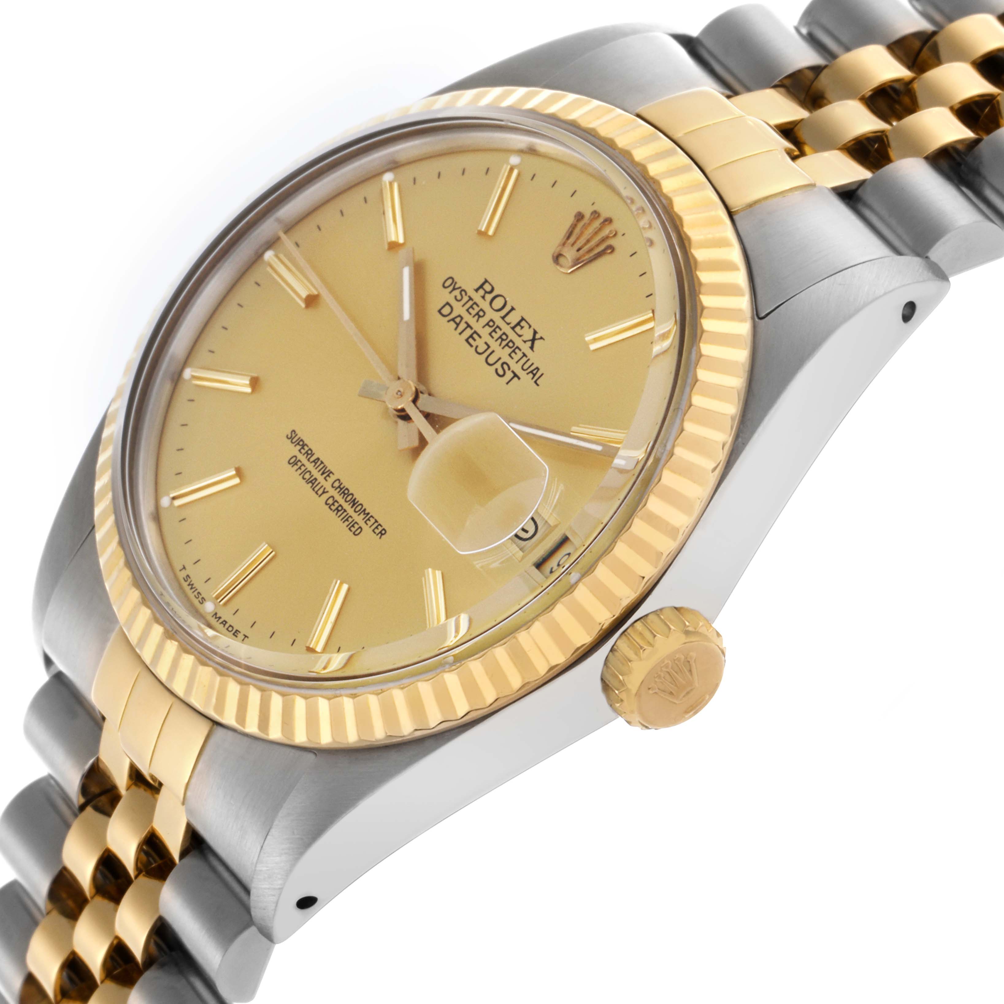 The Rolex Datejust 16013 Men's Steel and Gold (two tone) Champagne Dial 16013 Men's Steel and Gold (two tone) Champagne Dial is shown at an angled close-up, highlighting the dial, bezel, crown, and part of the bracelet.