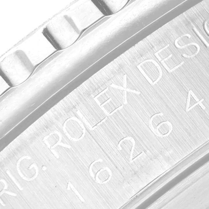 This close-up image shows the engraved writing on the caseback of a Rolex Turn-o-Graph 16264 Men's Stainless Steel Black Dial 16264 Men's Stainless Steel Black Dial watch.