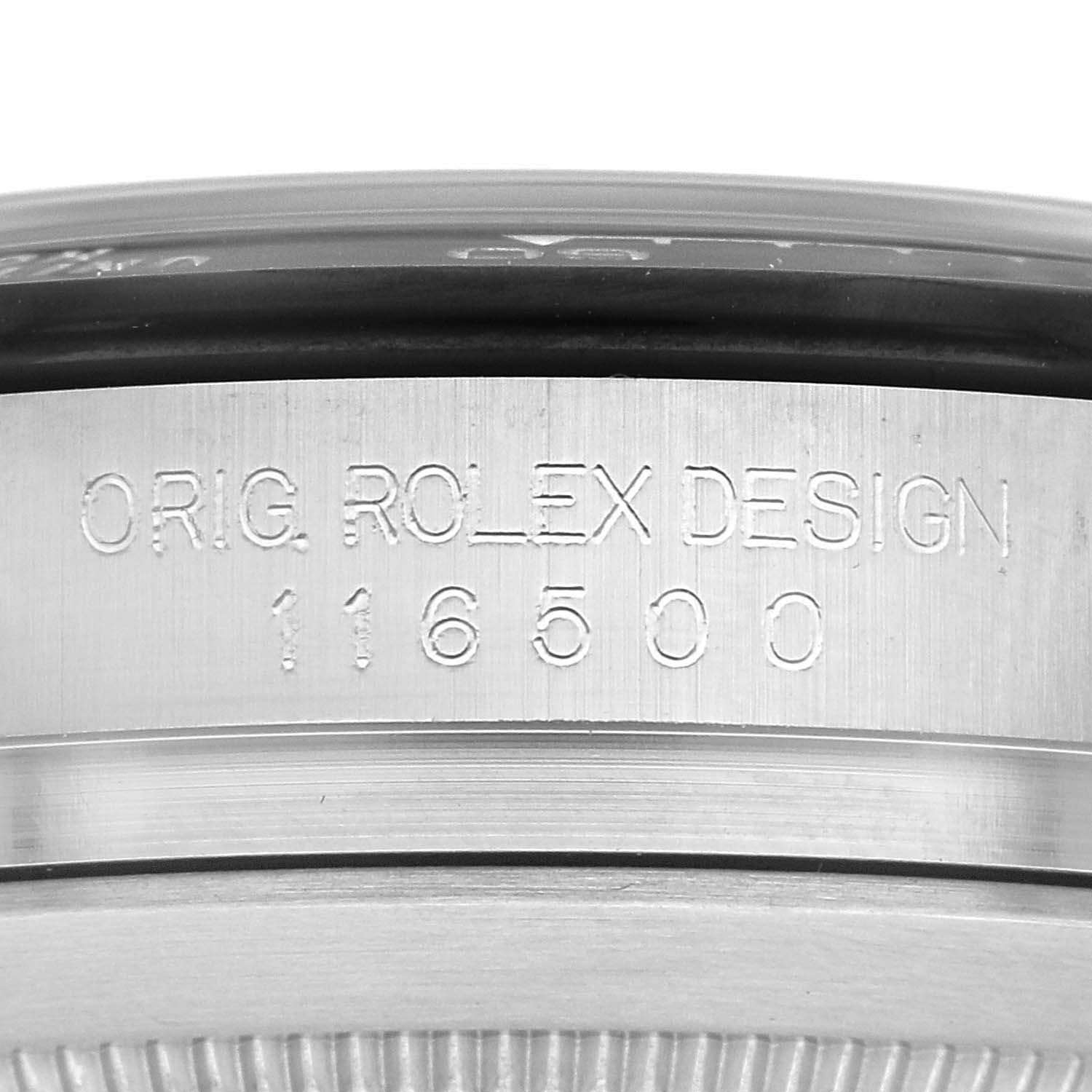 This close-up shows the engraved reference number "116500" on the case of a Rolex Daytona 116500 Men's Stainless Steel White Dial 116500 Men's Stainless Steel White Dial watch.