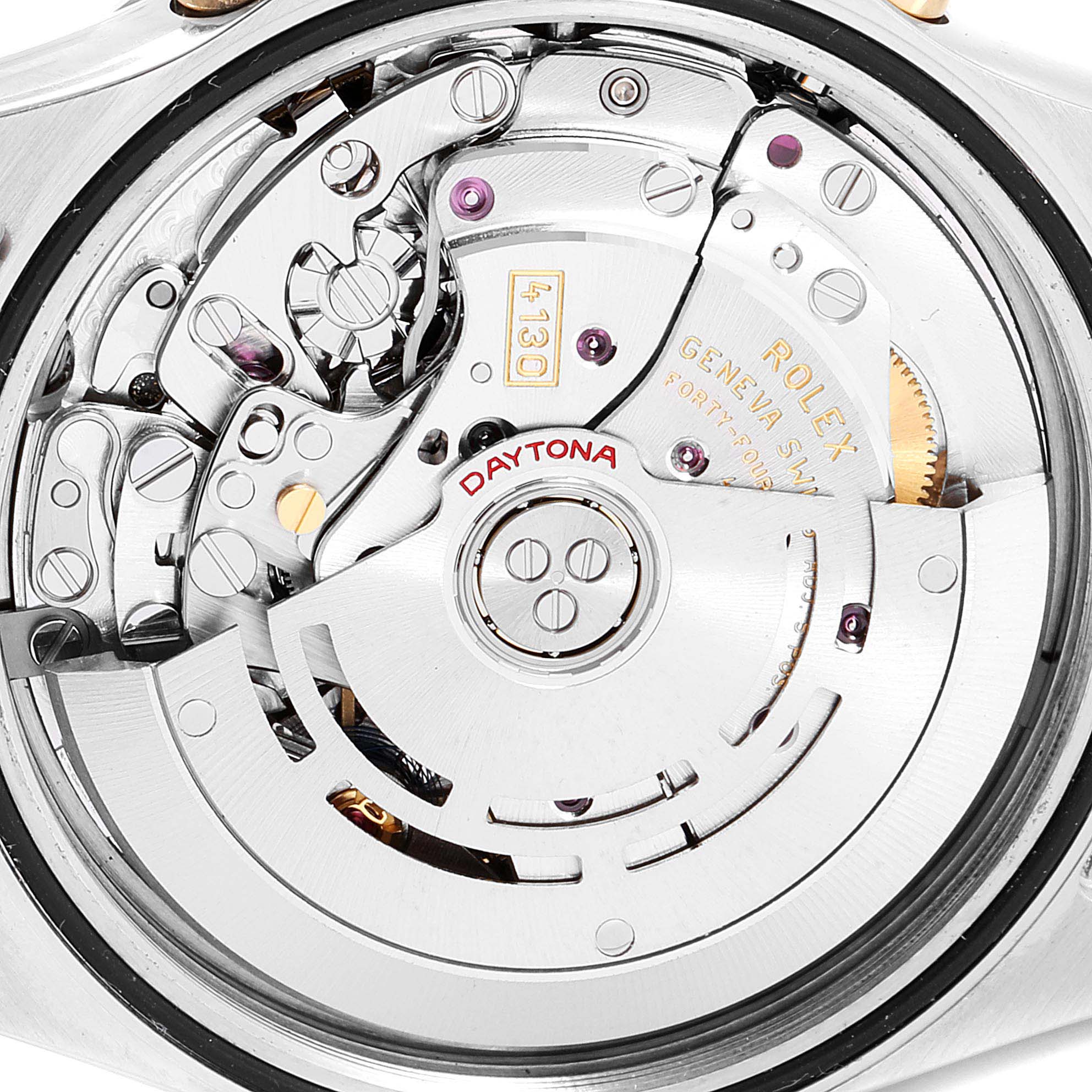 The image shows the internal mechanism of a Rolex Daytona 116523 Men
s Steel and Gold (two tone) Champagne Dial 116523 Men
s Steel and Gold (two tone) Champagne Dial watch, highlighting its intricate movement components.