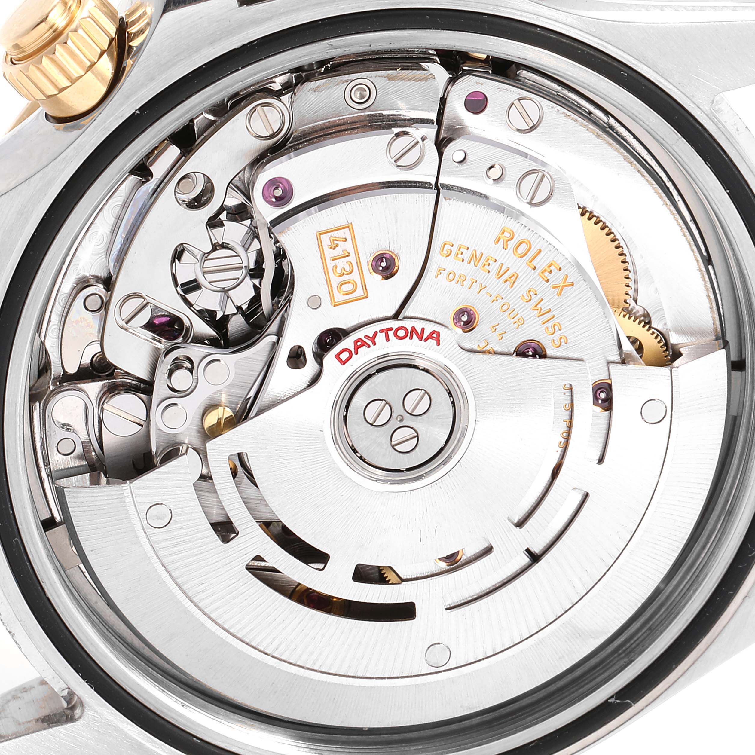 This image shows the movement and inner mechanism of a Rolex Daytona 116523 Men's Steel and Gold (two tone) Grey Dial 116523 Men's Steel and Gold (two tone) Grey Dial watch from a back angle.