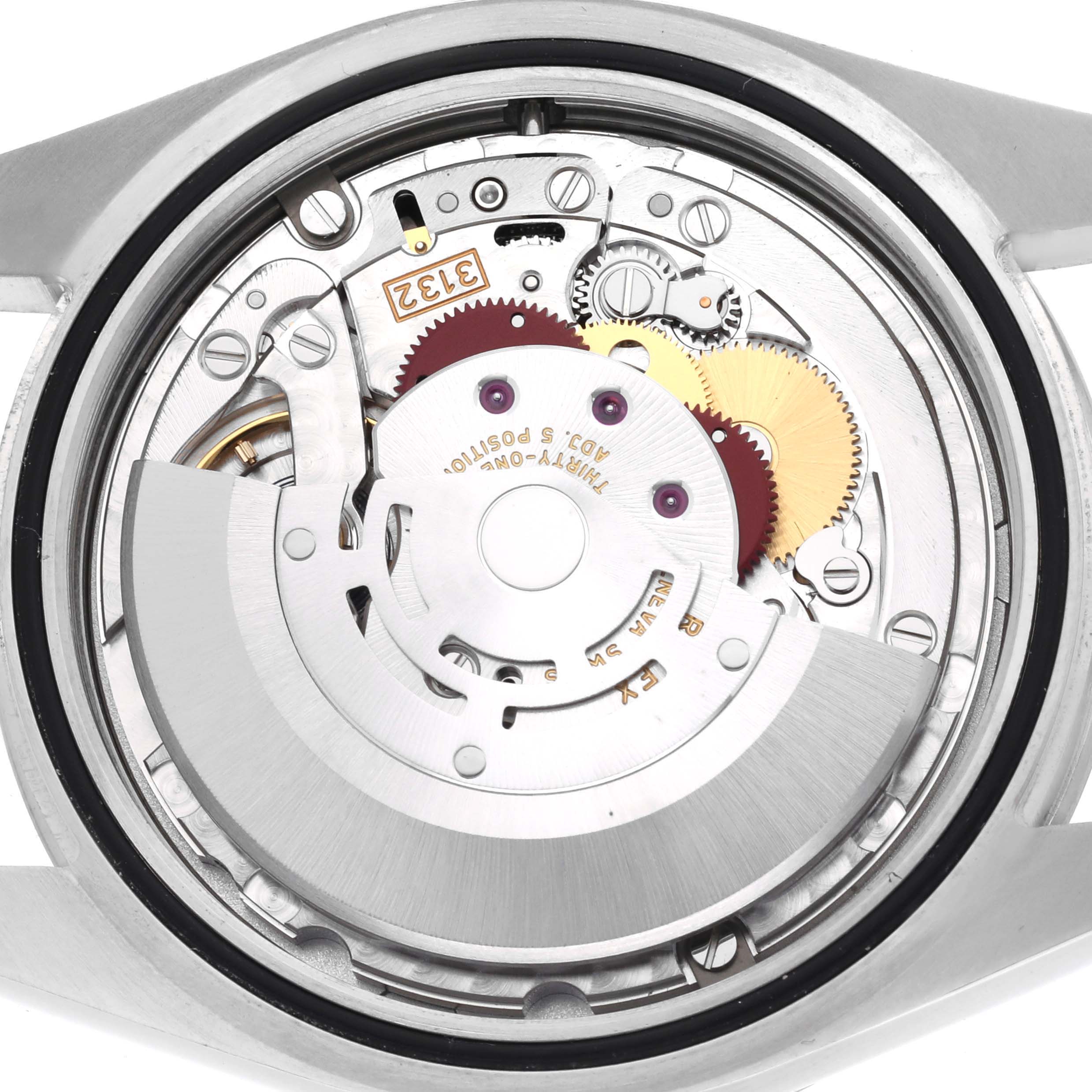 The image shows the back of a Rolex Explorer 214270 Men's Stainless Steel Black Dial 214270 Men's Stainless Steel Black Dial, focusing on its intricate mechanical movement.