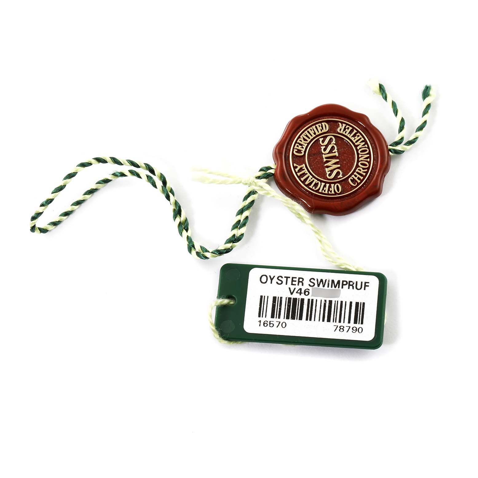 This image shows an accessory tag for the Rolex Explorer 16570 Men's Stainless Steel Black Dial 16570 Men's Stainless Steel Black Dial model watch, including an Oyster Swimpruf tag and a green and white string.