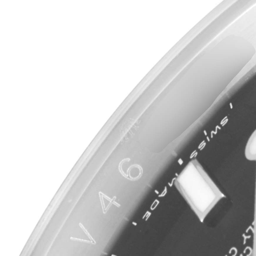 The image shows a close-up of a portion of the dial and the outer edge of the Rolex Explorer 16570 Men's Stainless Steel Black Dial 16570 Men's Stainless Steel Black Dial watch.