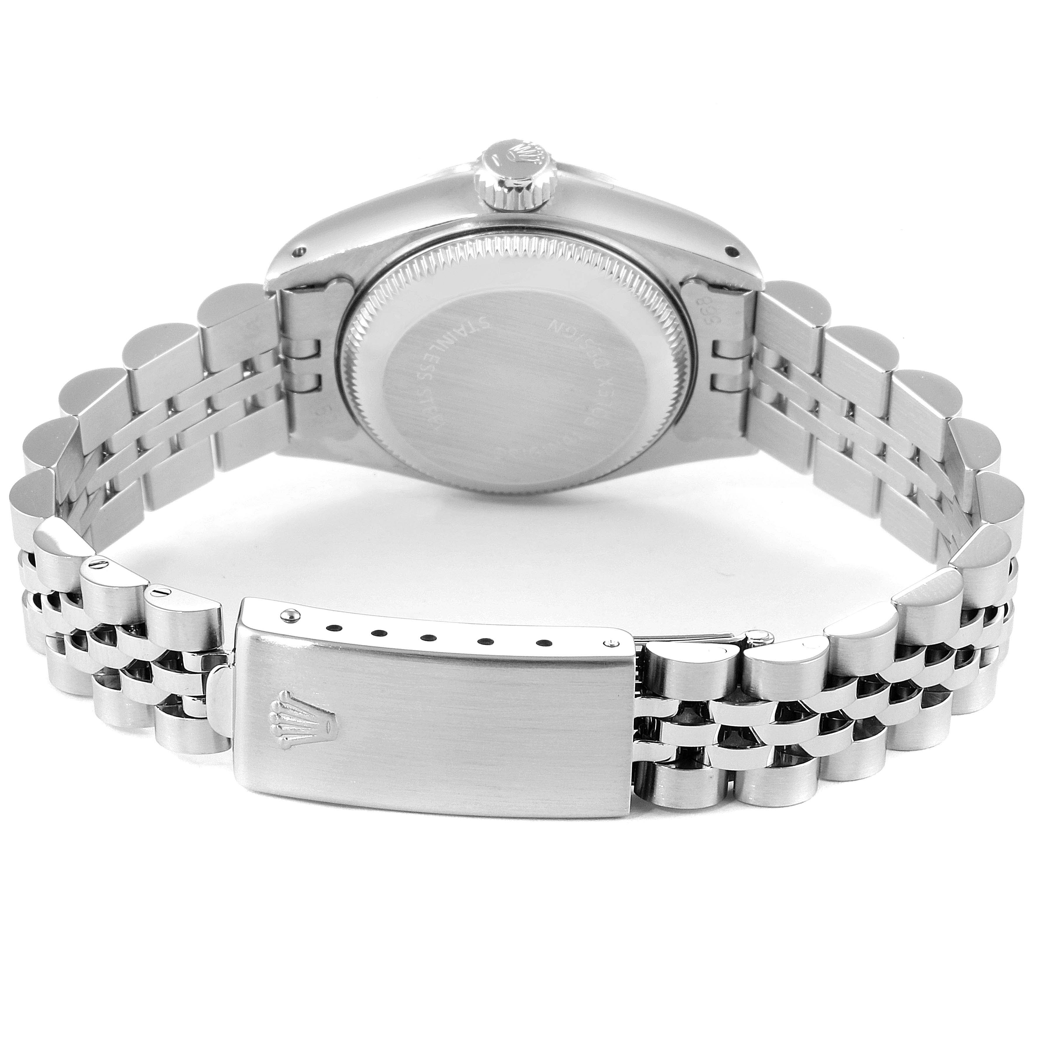 The Rolex Date 69190 Women
s Stainless Steel White Dial 69190 Women
s Stainless Steel White Dial model watch is shown from the back, featuring the case back and bracelet clasp.