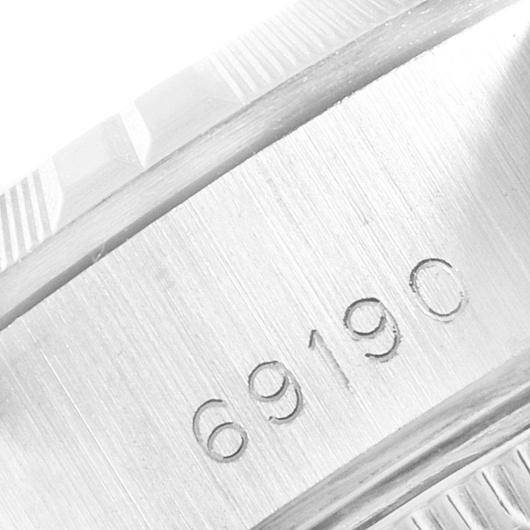 The image shows a close-up of the engraved model number "69190" on the case of a Rolex Date 69190 Women
s Stainless Steel White Dial 69190 Women
s Stainless Steel White Dial watch.