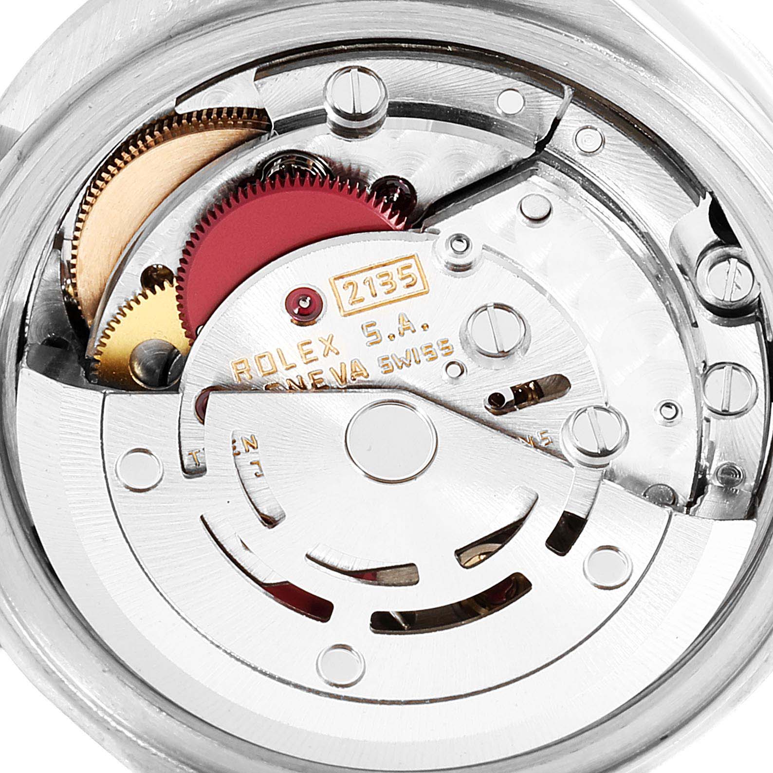This image shows the intricate internal mechanics of the Rolex Date 69190 Women
s Stainless Steel White Dial 69190 Women
s Stainless Steel White Dial model watch, focusing on the movement and gears.