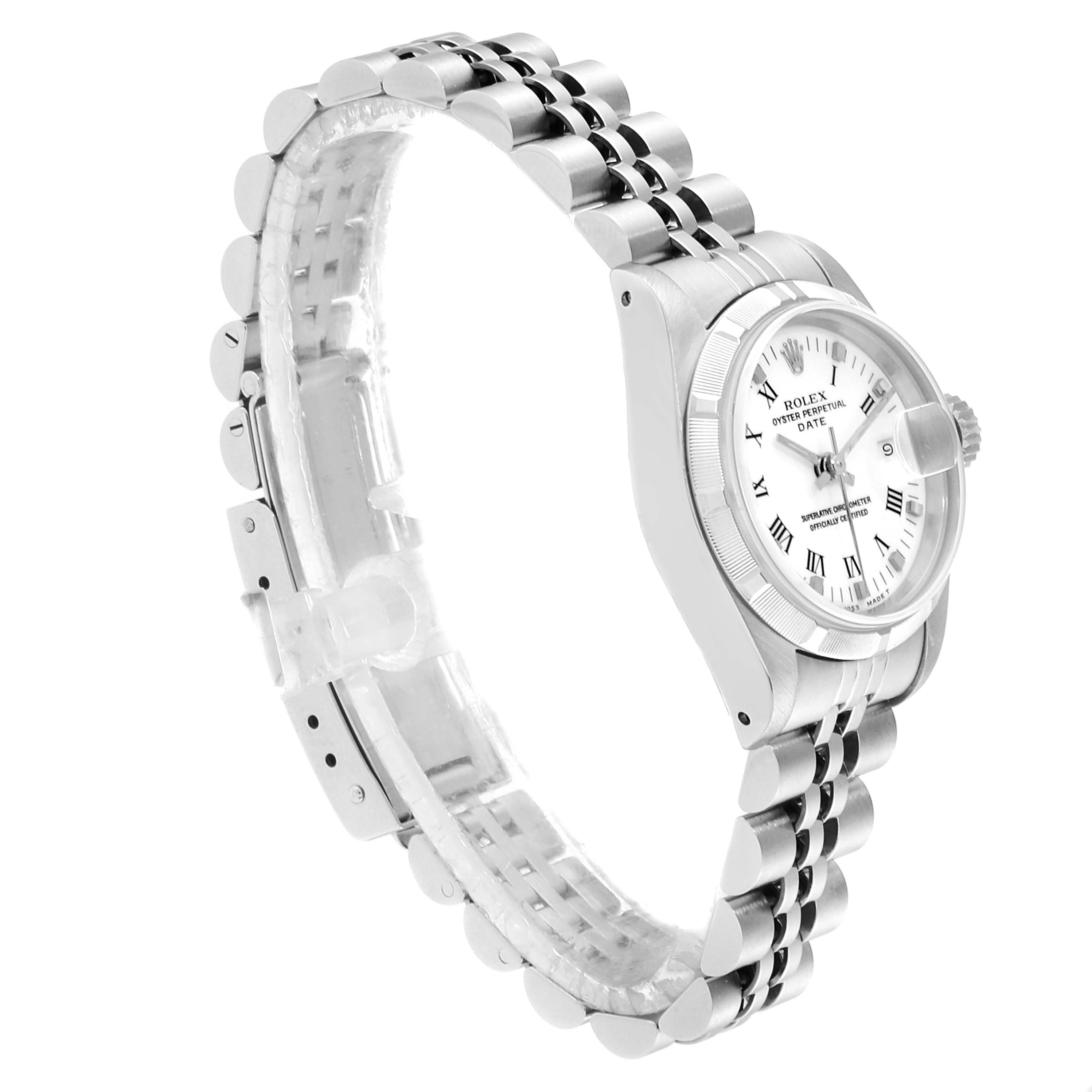 This image shows a side angle of the Rolex Date 69190 Women
s Stainless Steel White Dial 69190 Women
s Stainless Steel White Dial model, including the face, bezel, crown, and partially visible bracelet.