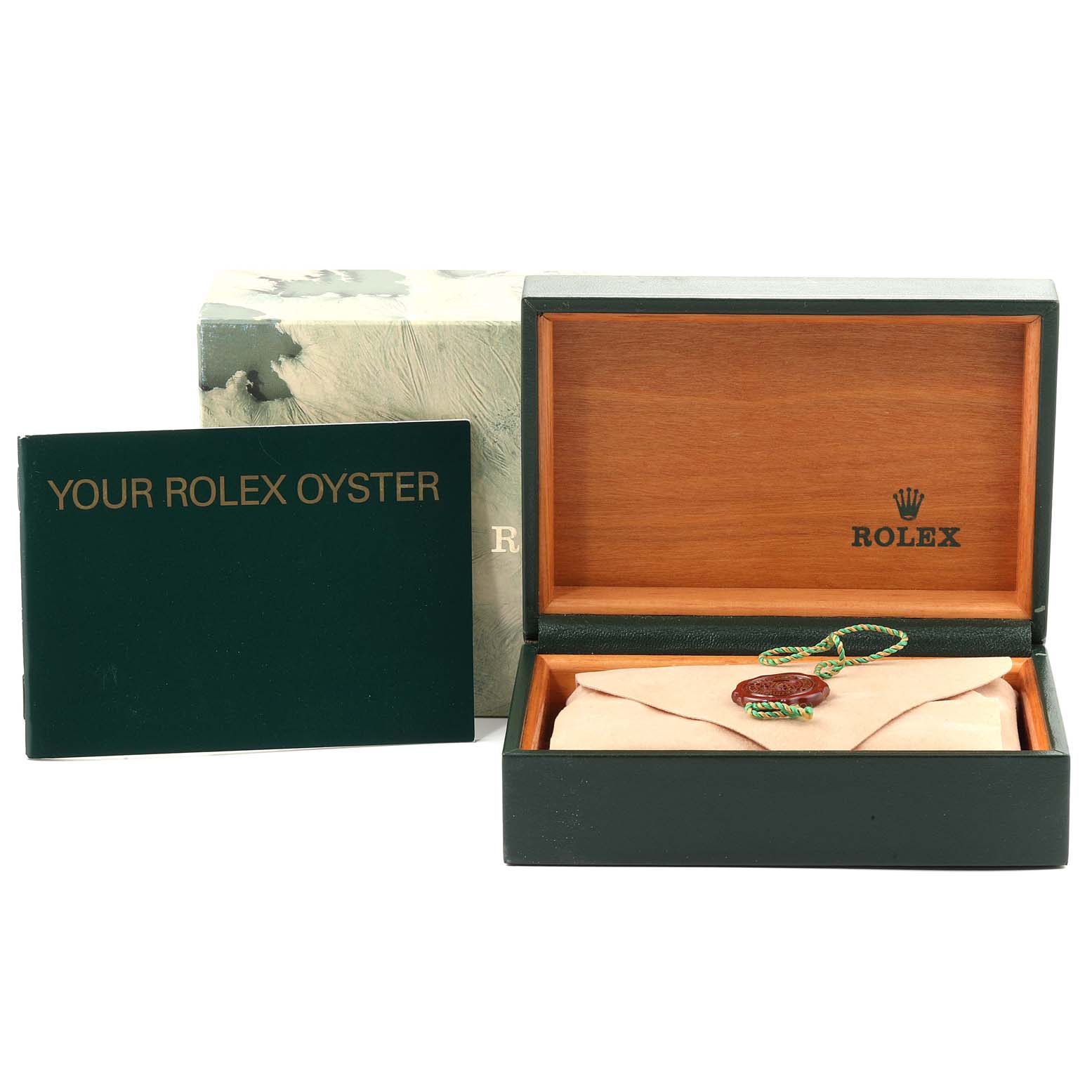 This image shows the packaging, manual, and accessories for a Rolex Oyster Perpetual 14203 Men's Steel and Gold (two tone) White Dial 14203 Men's Steel and Gold (two tone) White Dial watch.