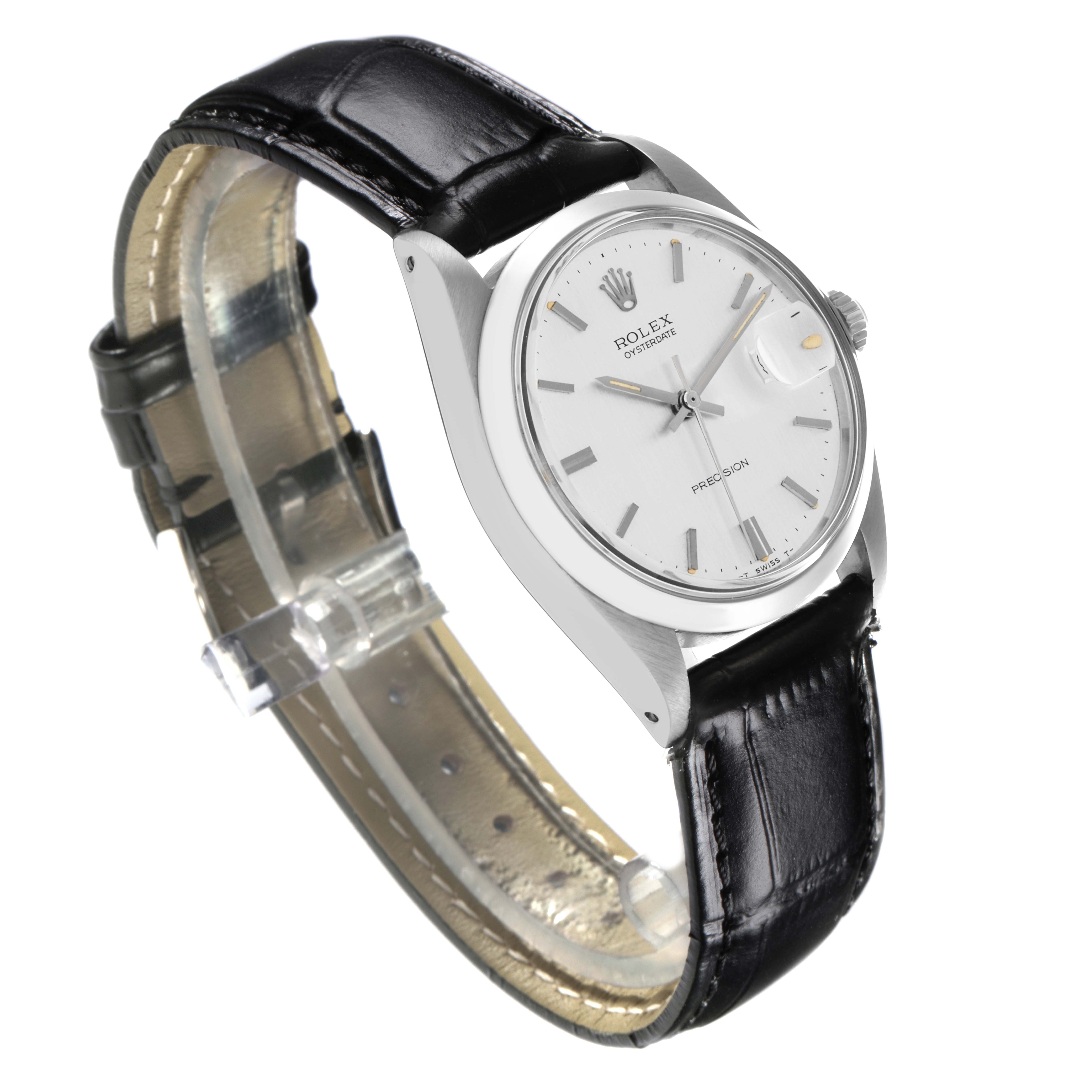 The Rolex Date model watch is shown at a front angle, displaying the face, case, crown, and part of the leather strap.