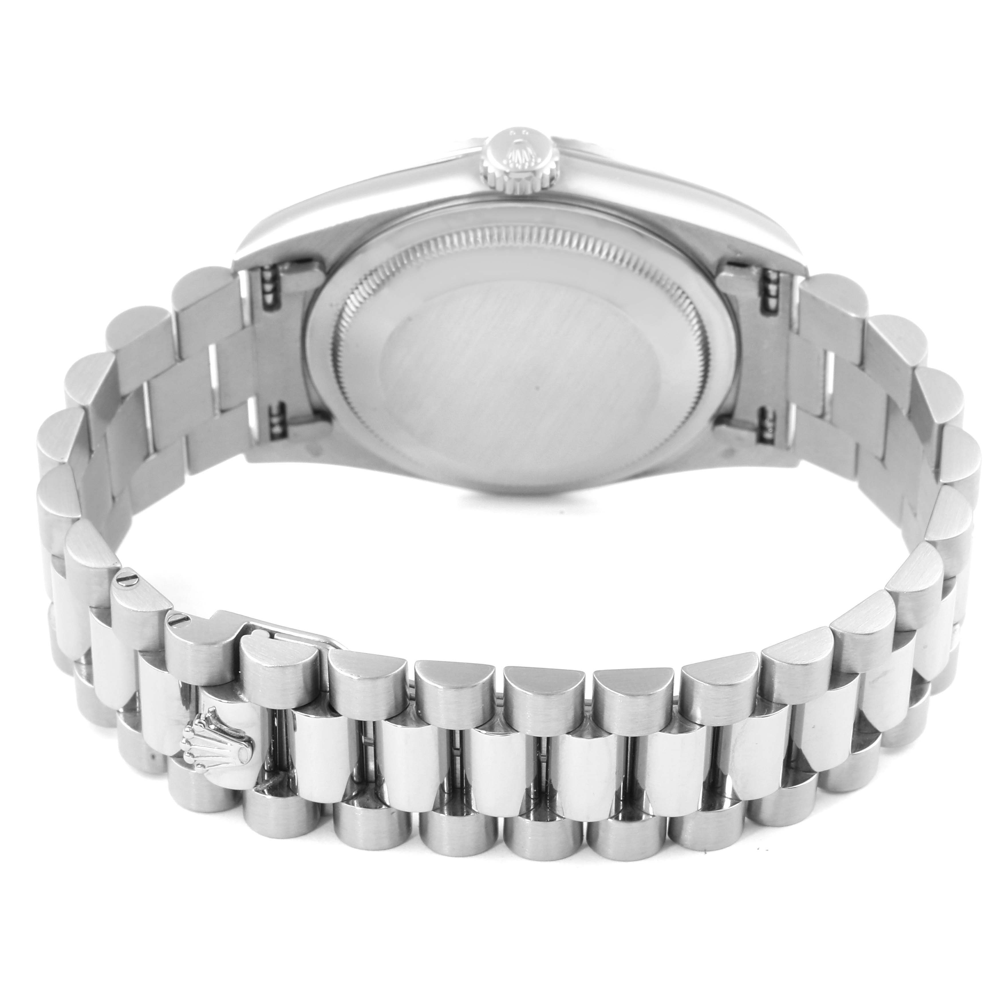 The image shows the back view of a Rolex President 18239 Men
s White Gold Silver Dial 18239 Men
s White Gold Silver Dial model watch, highlighting its case back and bracelet.