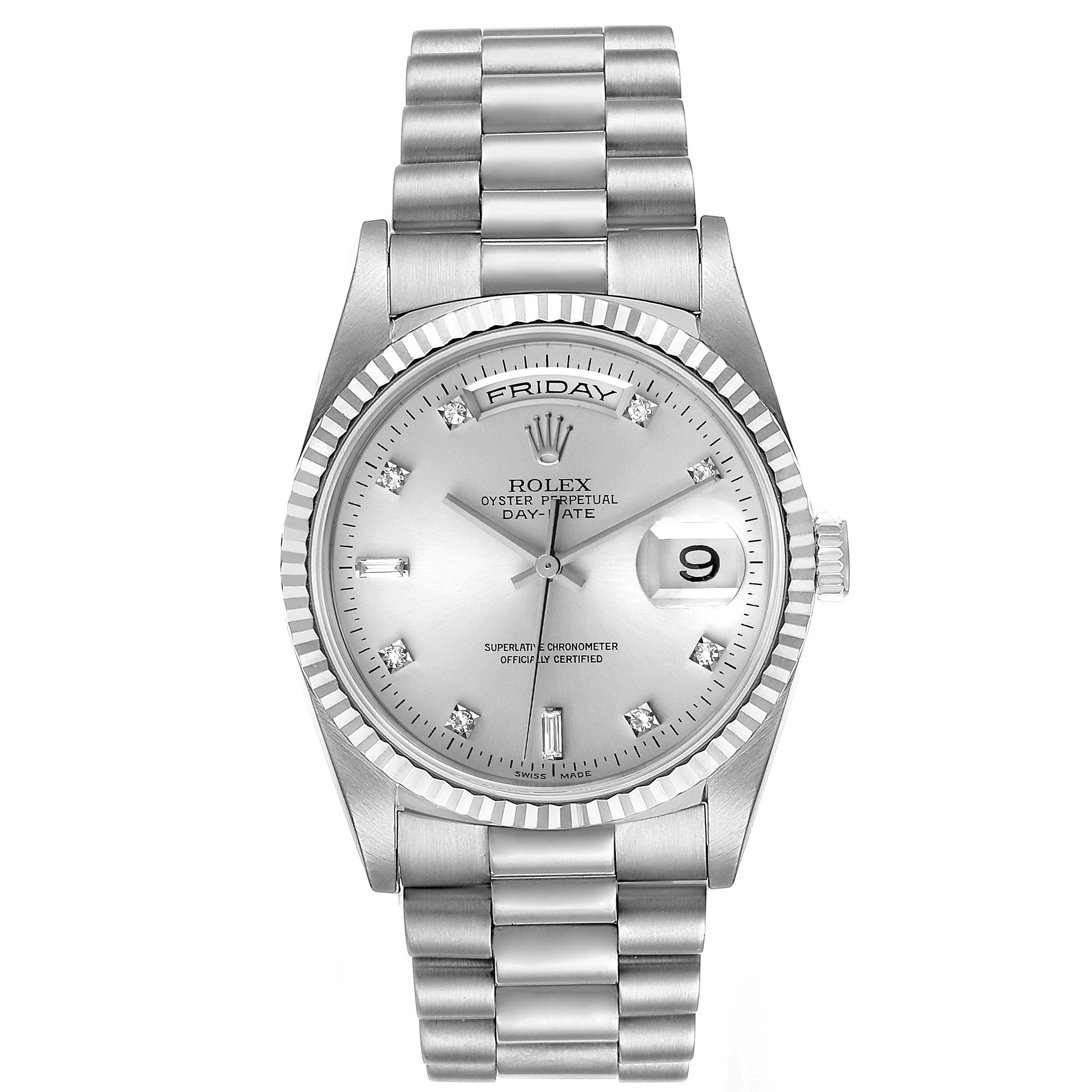 The image shows a front view of the Rolex President 18239 Men
s White Gold Silver Dial 18239 Men
s White Gold Silver Dial model watch, featuring its silver dial, day-date display, and link bracelet.