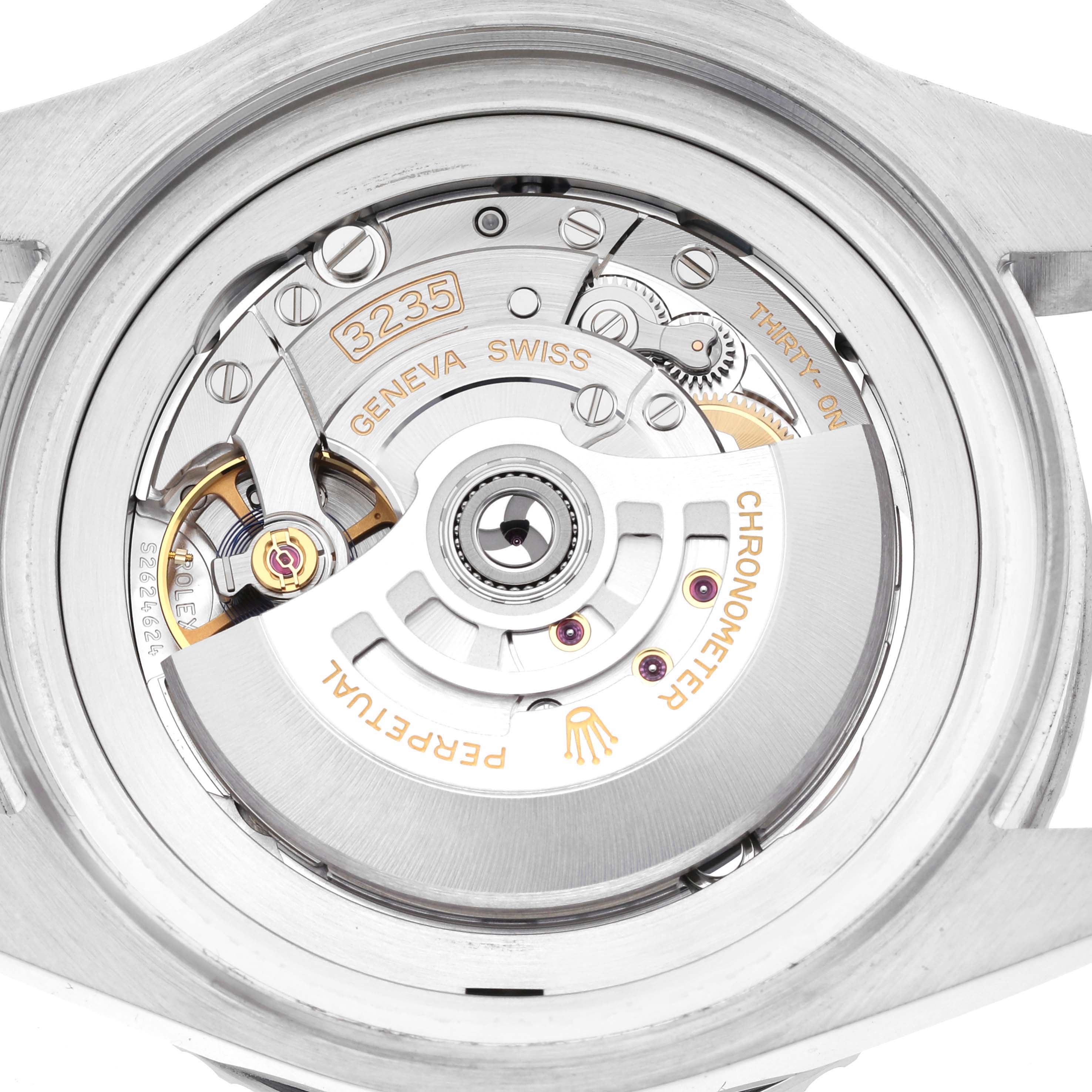 The image shows the inner mechanics and movement of the Rolex Sea-Dweller 136660 Men
s Stainless Steel Black Dial 136660 Men
s Stainless Steel Black Dial watch viewed from the back.