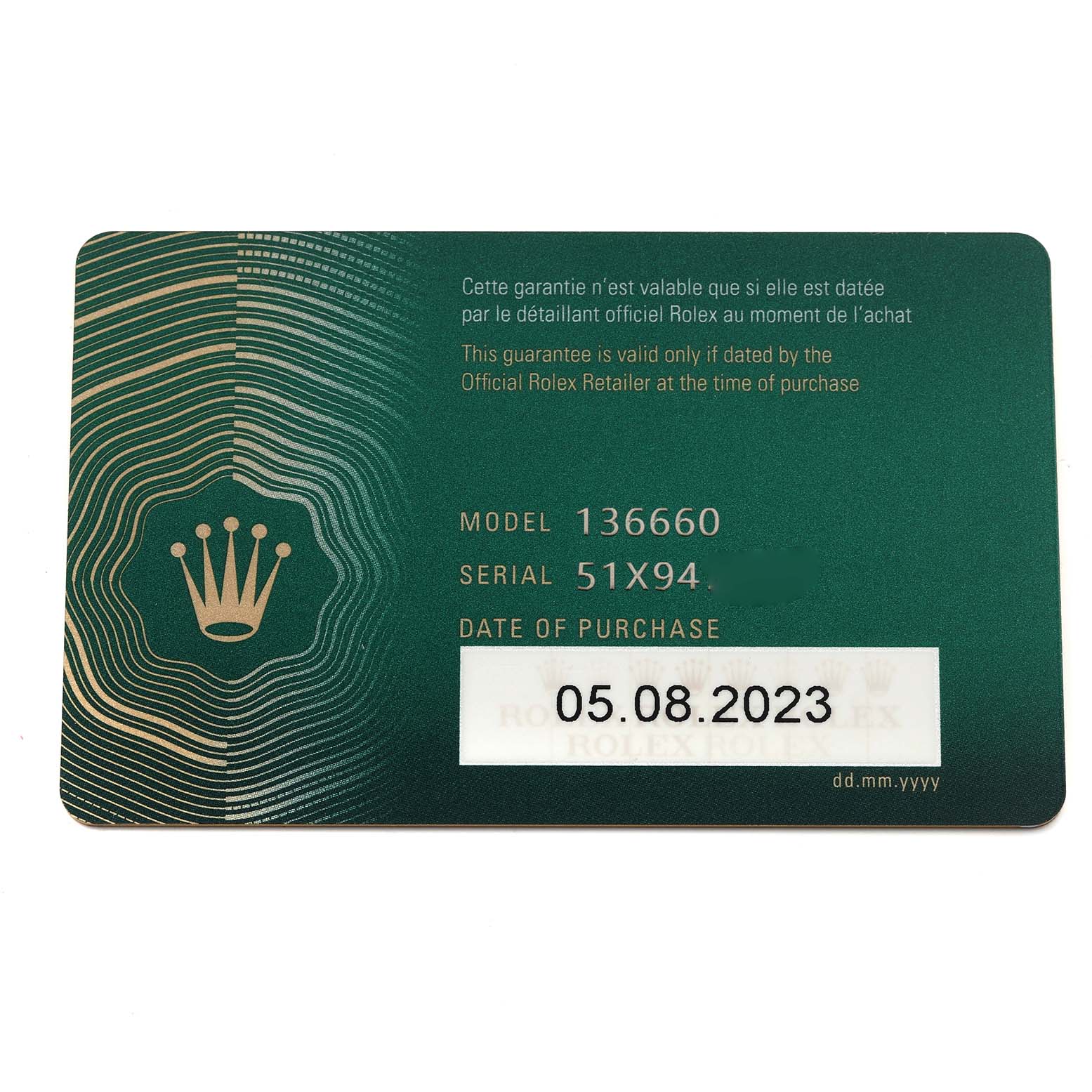 This image shows a Rolex warranty card for the Sea-Dweller model 136660, displaying serial number and purchase date.