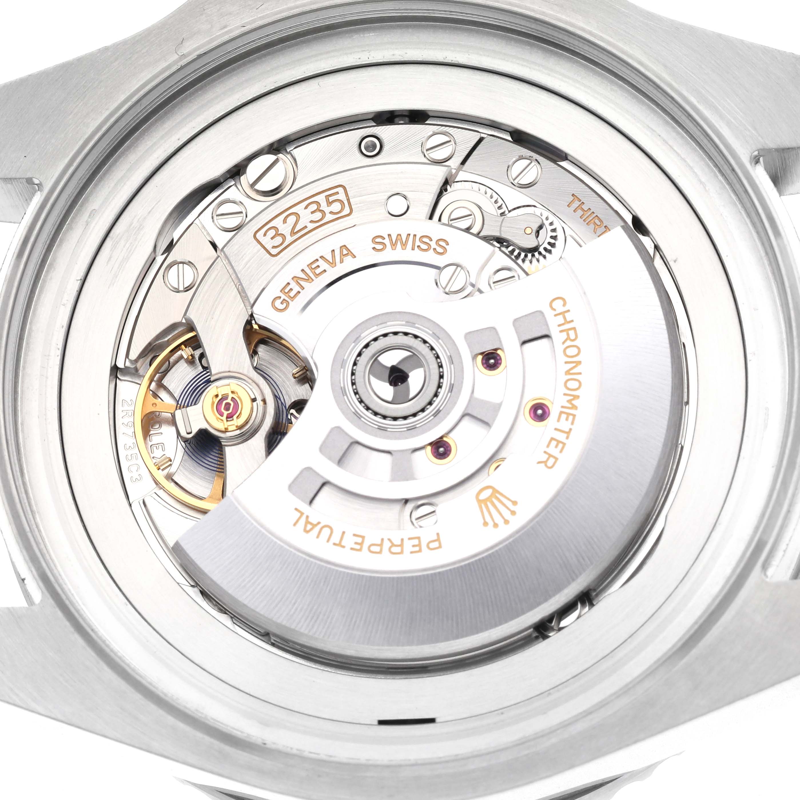 The image shows the open back view of a Rolex Sea-Dweller 136660 Men's Stainless Steel Black Dial 136660 Men's Stainless Steel Black Dial, revealing the intricate mechanical movement inside.