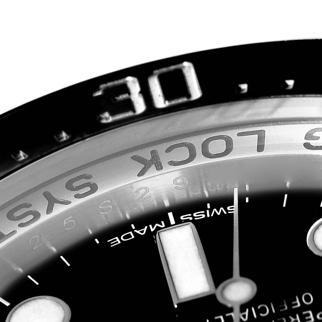 This image shows a close-up of the dial and part of the bezel of the Rolex Sea-Dweller 116660 Men
s Stainless Steel Blue Dial 116660 Men
s Stainless Steel Blue Dial watch from a top-down angle.