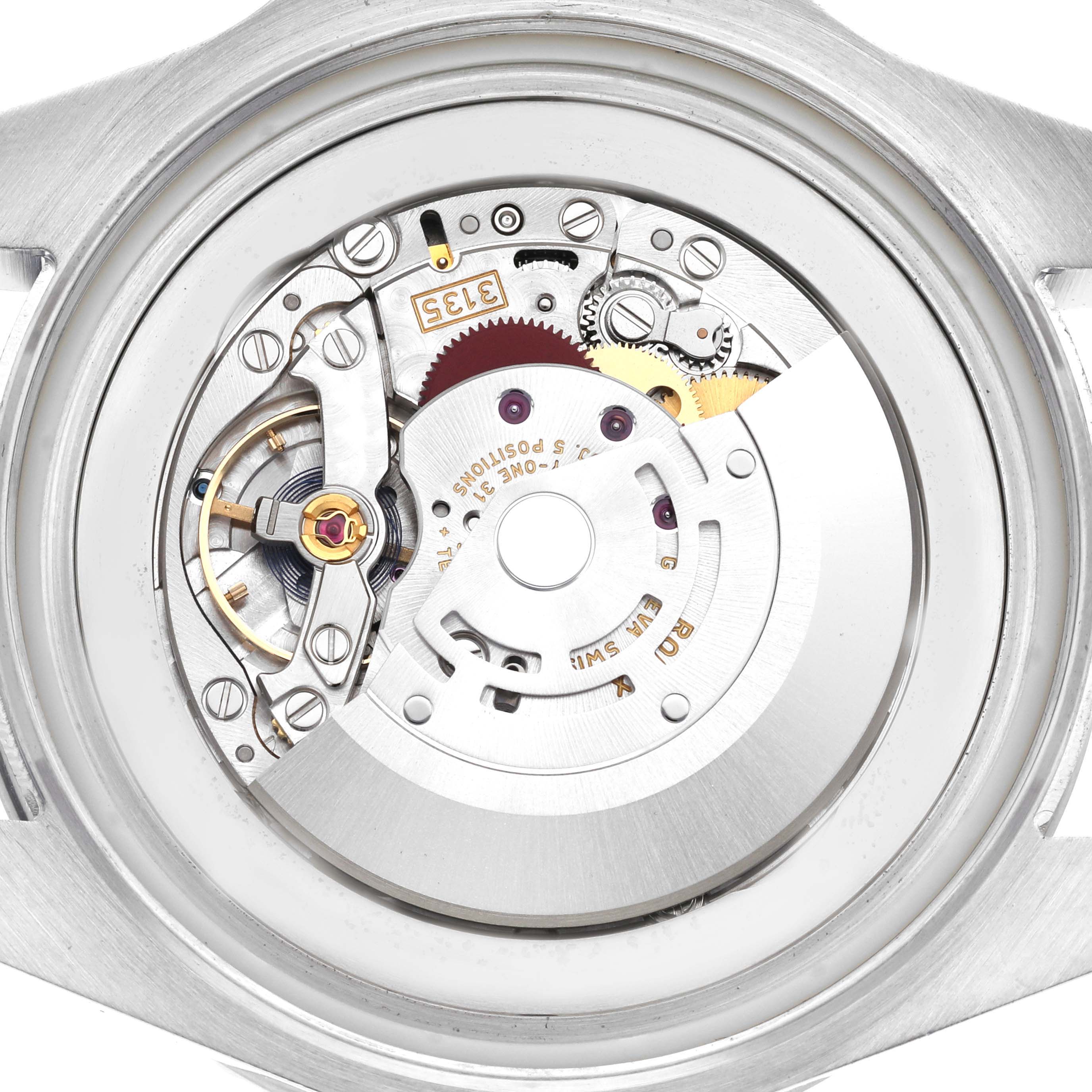 The image shows the intricate internal mechanism of the Rolex Sea-Dweller 116660 Men
s Stainless Steel Blue Dial 116660 Men
s Stainless Steel Blue Dial watch from a back angle.