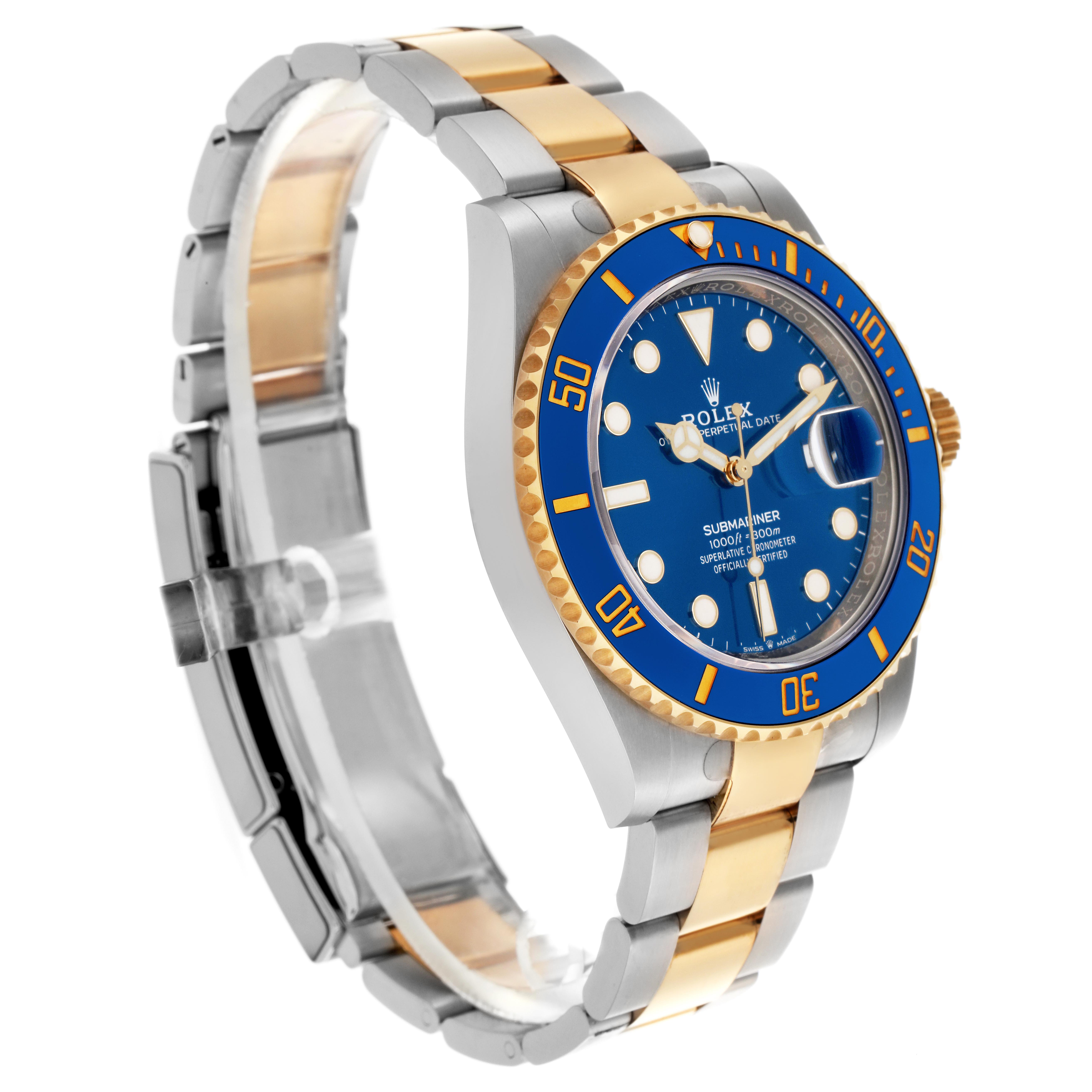 The Rolex Submariner 126613 Men's Steel and Gold (two tone) Blue Dial 126613 Men's Steel and Gold (two tone) Blue Dial is shown at a three-quarter angle, highlighting the bezel, dial, bracelet, and crown.