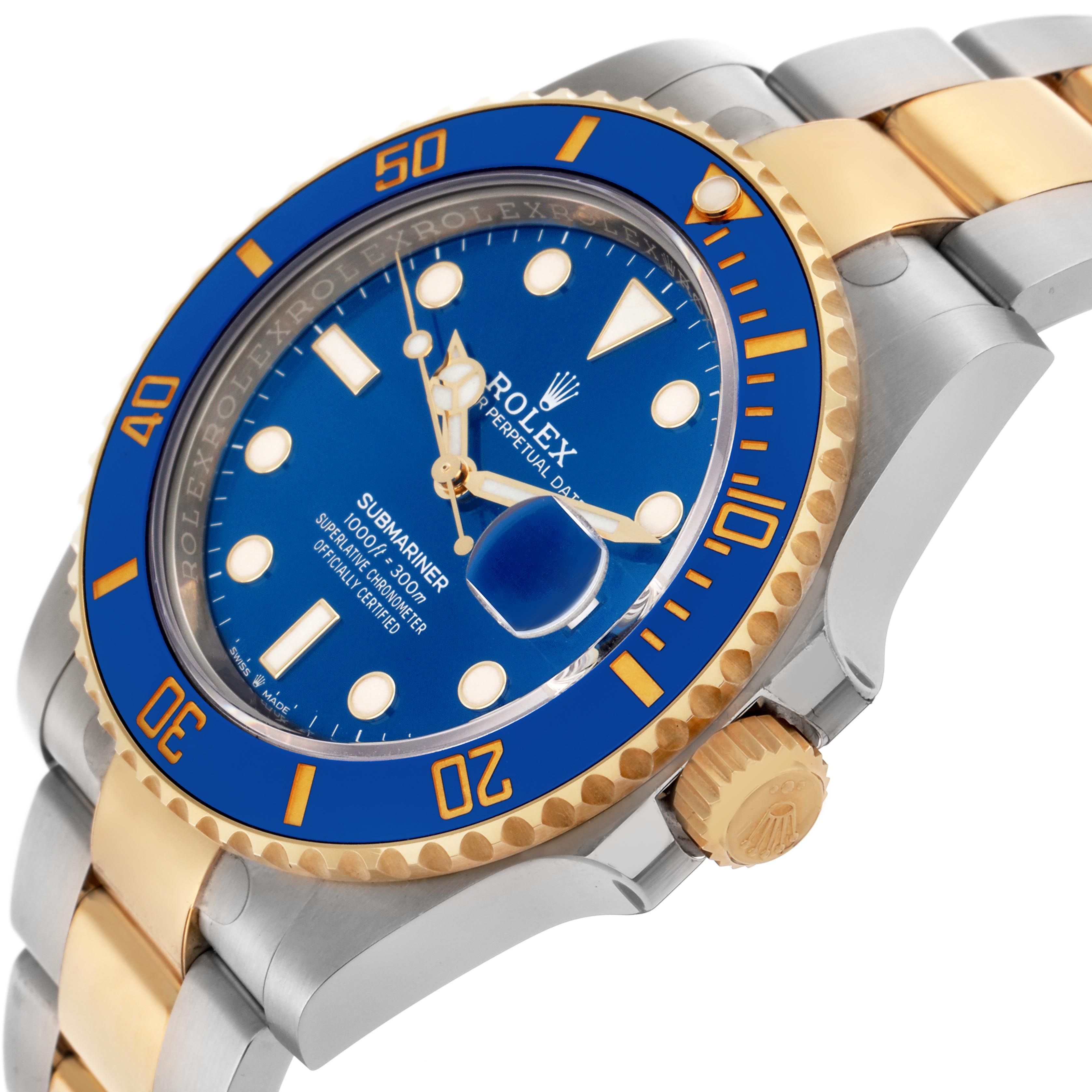 The Rolex Submariner 126613 Men's Steel and Gold (two tone) Blue Dial 126613 Men's Steel and Gold (two tone) Blue Dial is shown at an angled side view, highlighting the bezel, dial, crown, and bracelet.