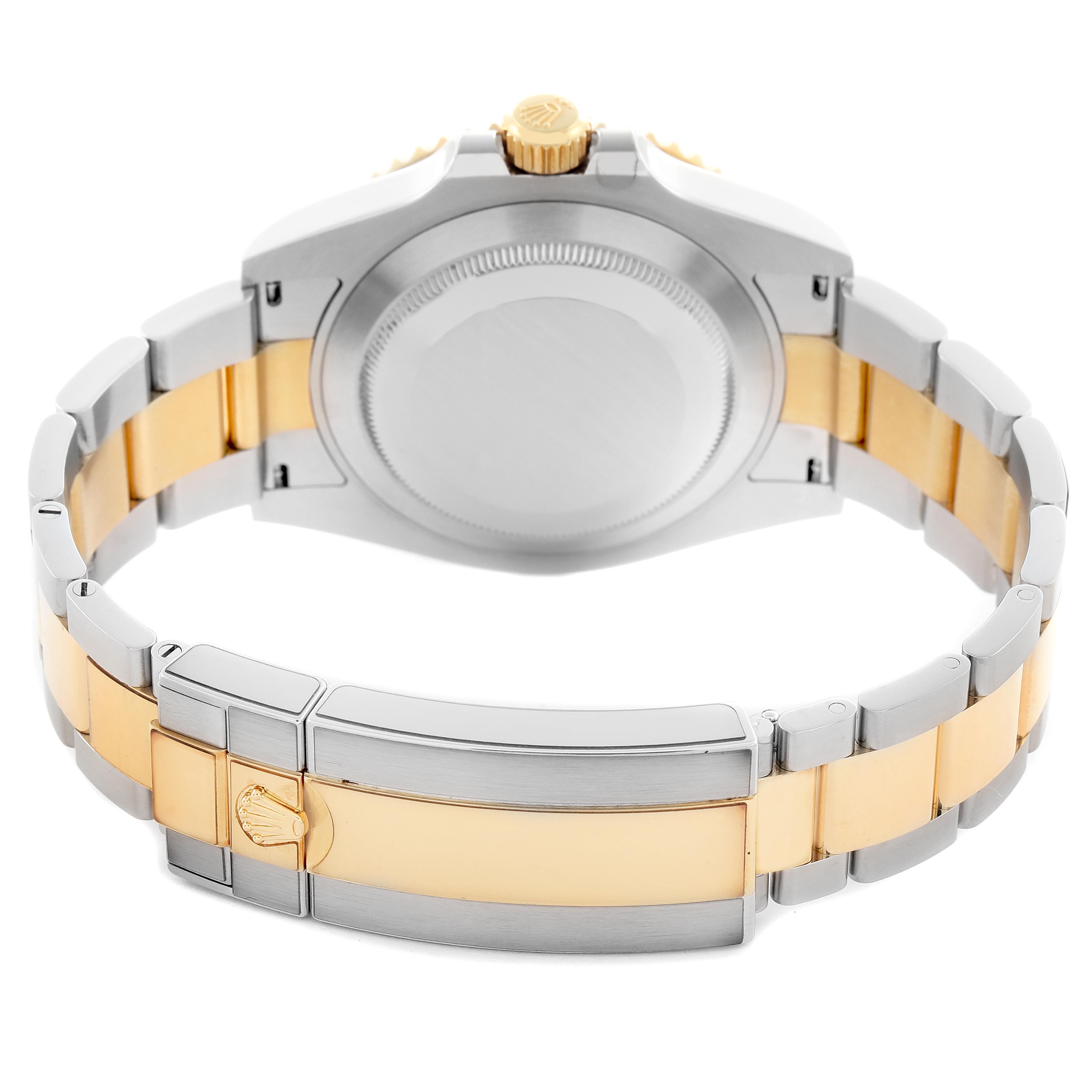 The image shows the back of a Rolex Submariner 126613 Men's Steel and Gold (two tone) Blue Dial 126613 Men's Steel and Gold (two tone) Blue Dial, highlighting the clasp and bracelet in two-tone metal.