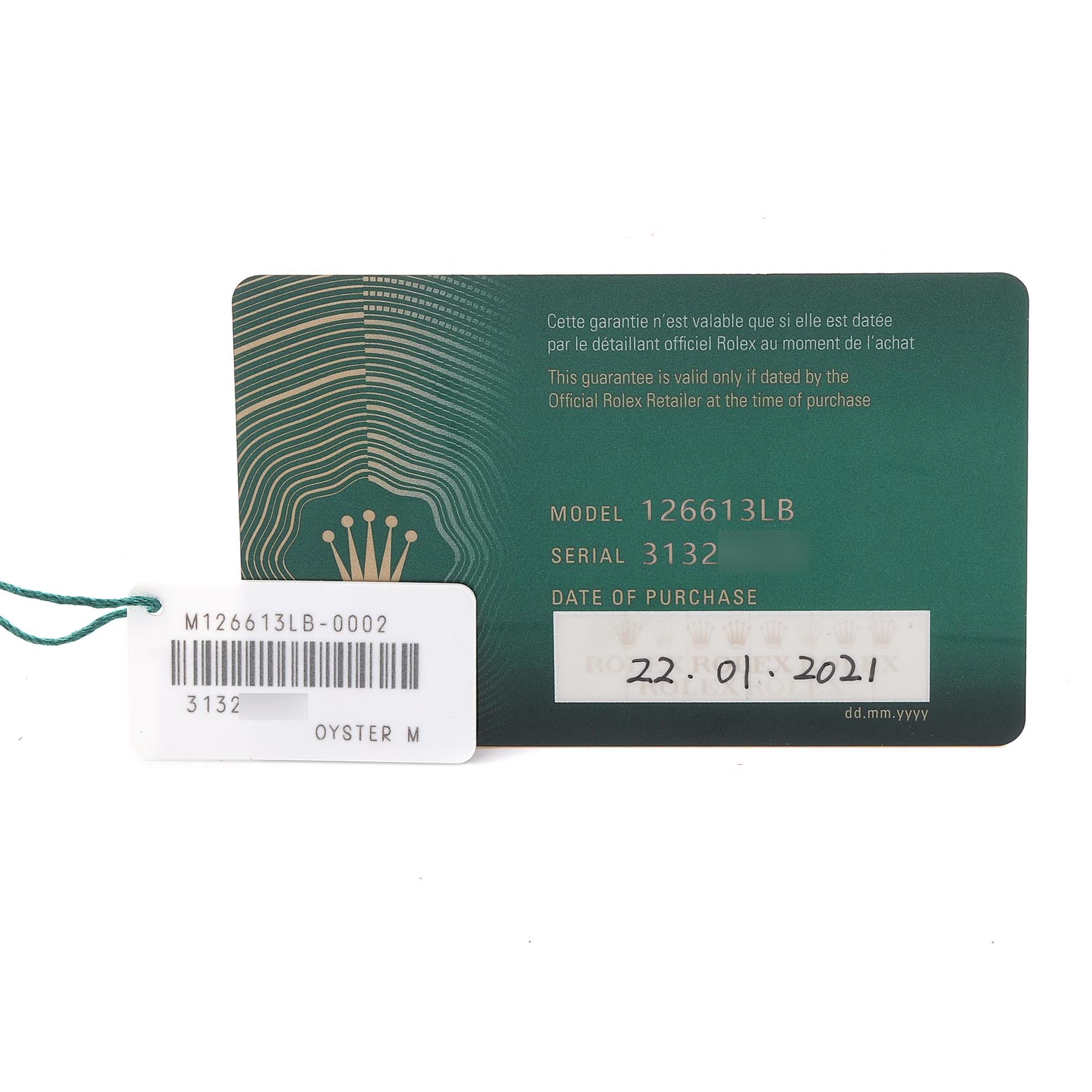 The image shows a warranty card and tag for the Rolex Submariner 126613 Men's Steel and Gold (two tone) Blue Dial 126613 Men's Steel and Gold (two tone) Blue Dial, model 126613LB, highlighting serial number and purchase date.