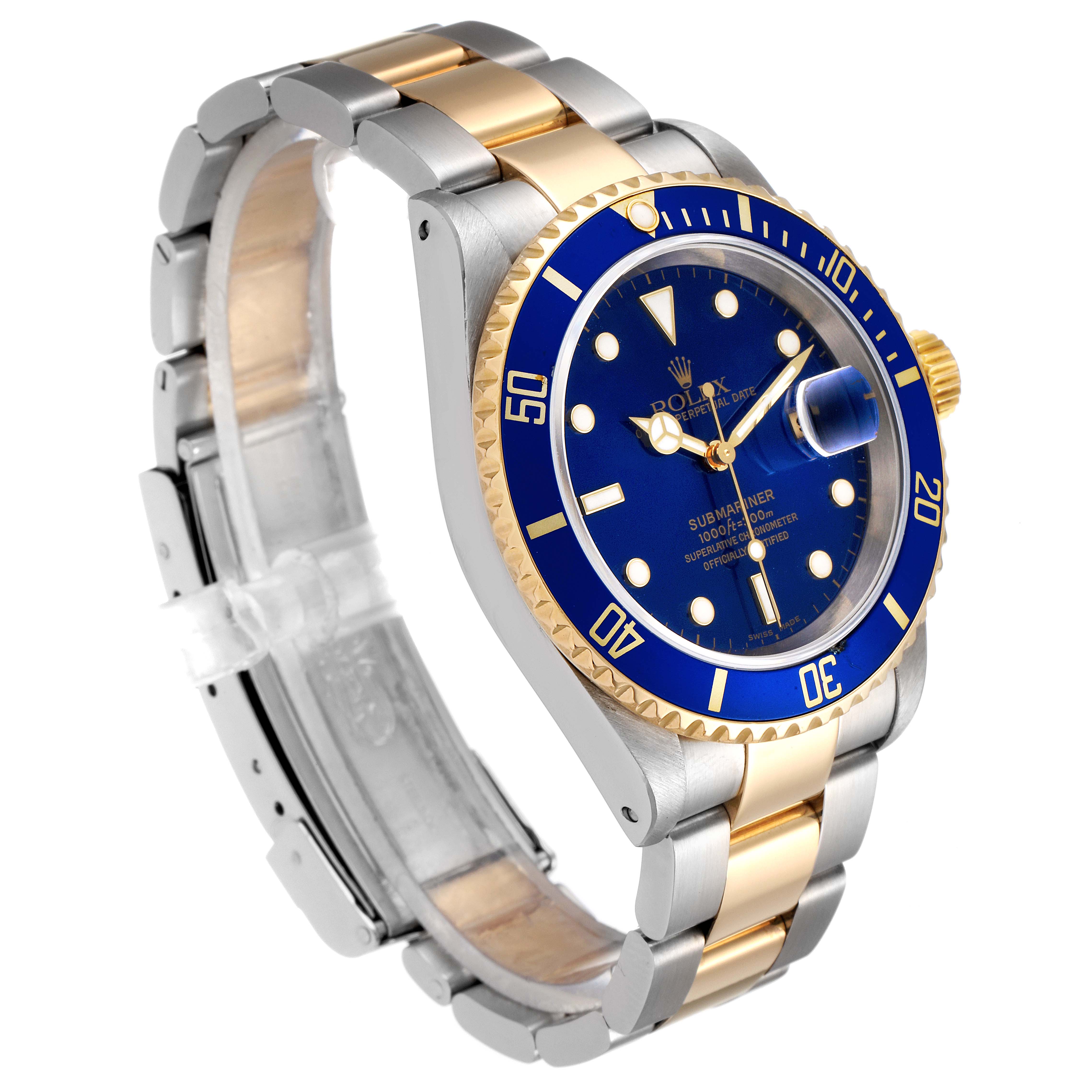 The image shows a Rolex Submariner 16613 Men
s Steel and Gold (two tone) Blue Dial 16613 Men
s Steel and Gold (two tone) Blue Dial watch at a side angle, highlighting the blue dial, bezel, and two-tone metal bracelet.
