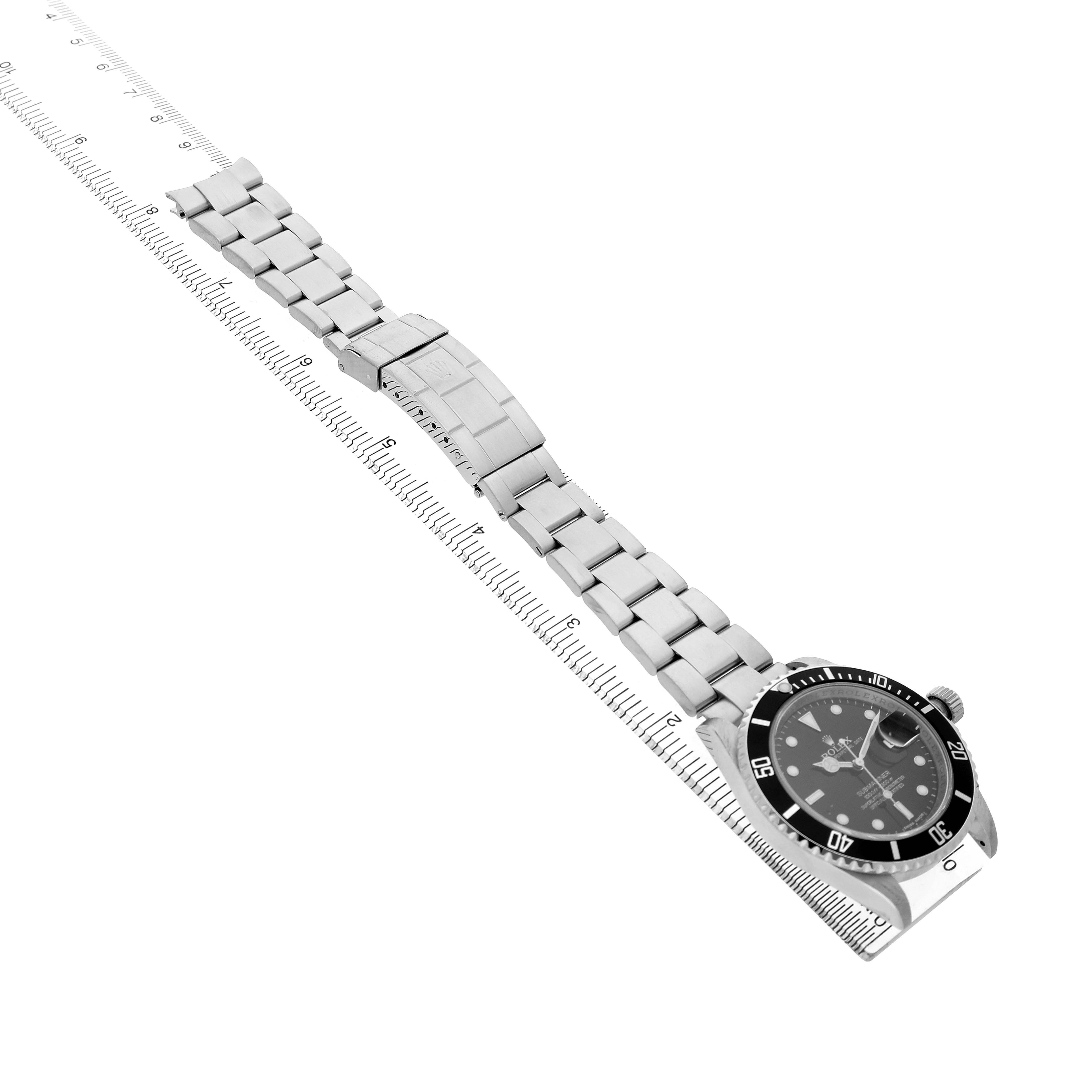 The Rolex Submariner 16610 T Men's Stainless Steel Black Dial watch is shown diagonally, featuring the face, bezel, bracelet, and deployment clasp.