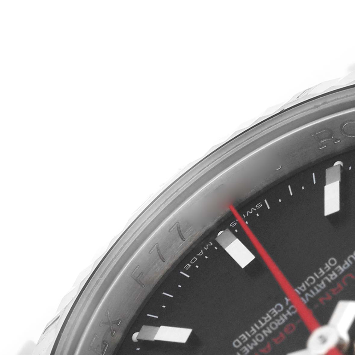 The image shows a close-up angle of the bezel, dial, and hour markers of a Rolex Turn-o-Graph 116264 Men's Stainless Steel Black Dial watch.
