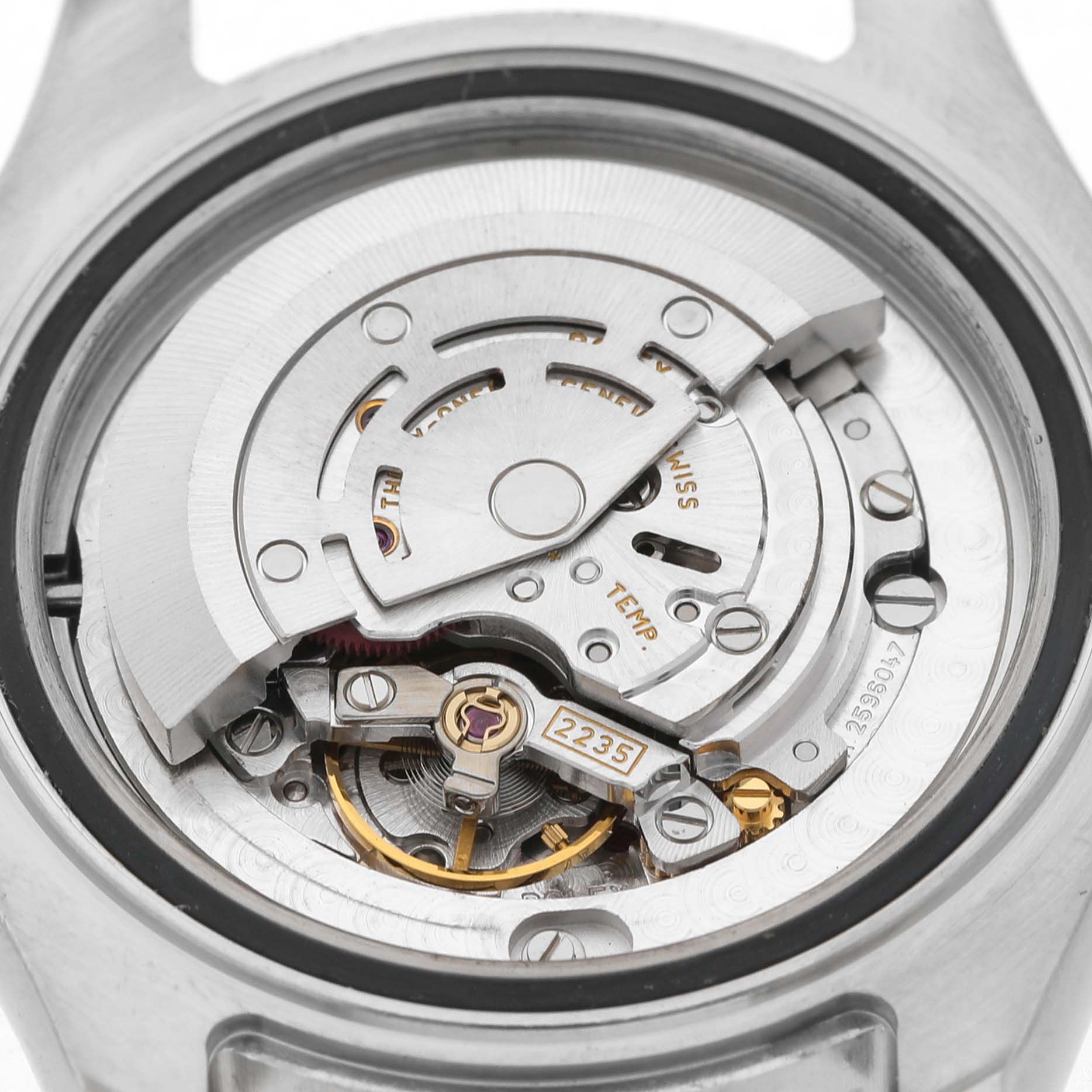 The image shows a detailed view of the movement inside the Rolex Yacht-Master 168622 Men's Stainless Steel Silver Dial watch, emphasizing its mechanical components.