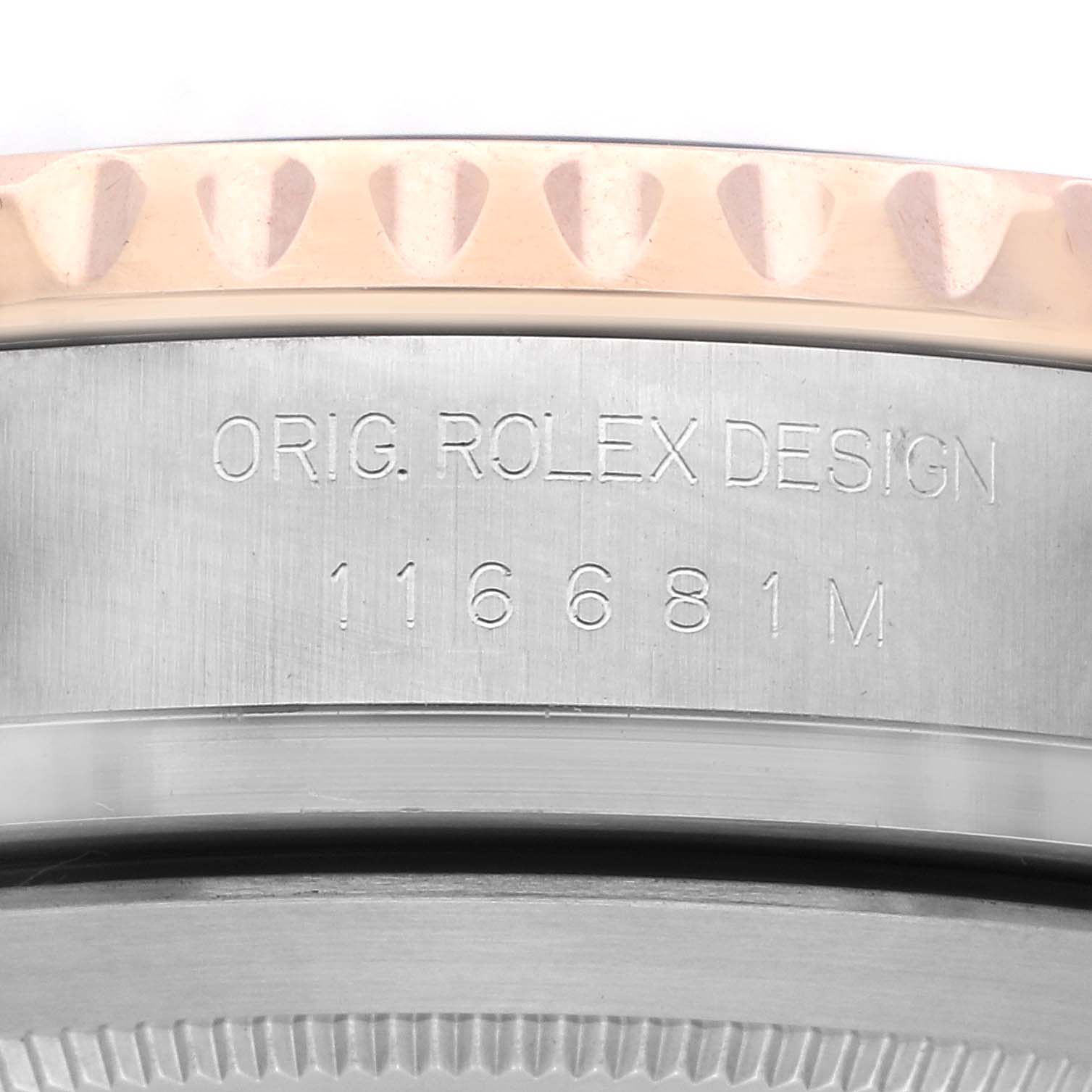 The image shows the side profile of the Rolex Yacht-Master 116681 Men's Steel and Gold (two tone) White Dial 116681 Men's Steel and Gold (two tone) White Dial, focusing on the engraved case design and model number.