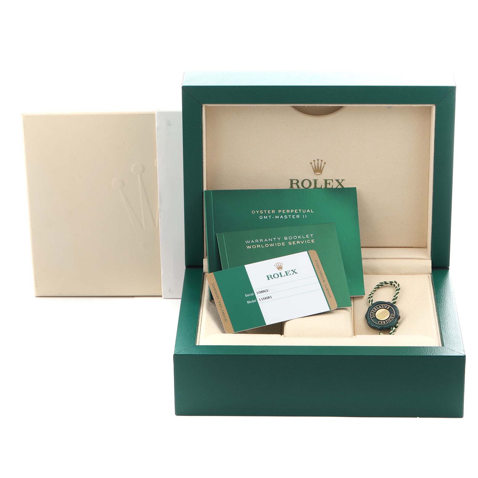The image shows the open box and accessories of a Rolex Yacht-Master 116681 Men's Steel and Gold (two tone) White Dial 116681 Men's Steel and Gold (two tone) White Dial, including the warranty card, booklet, and tag.