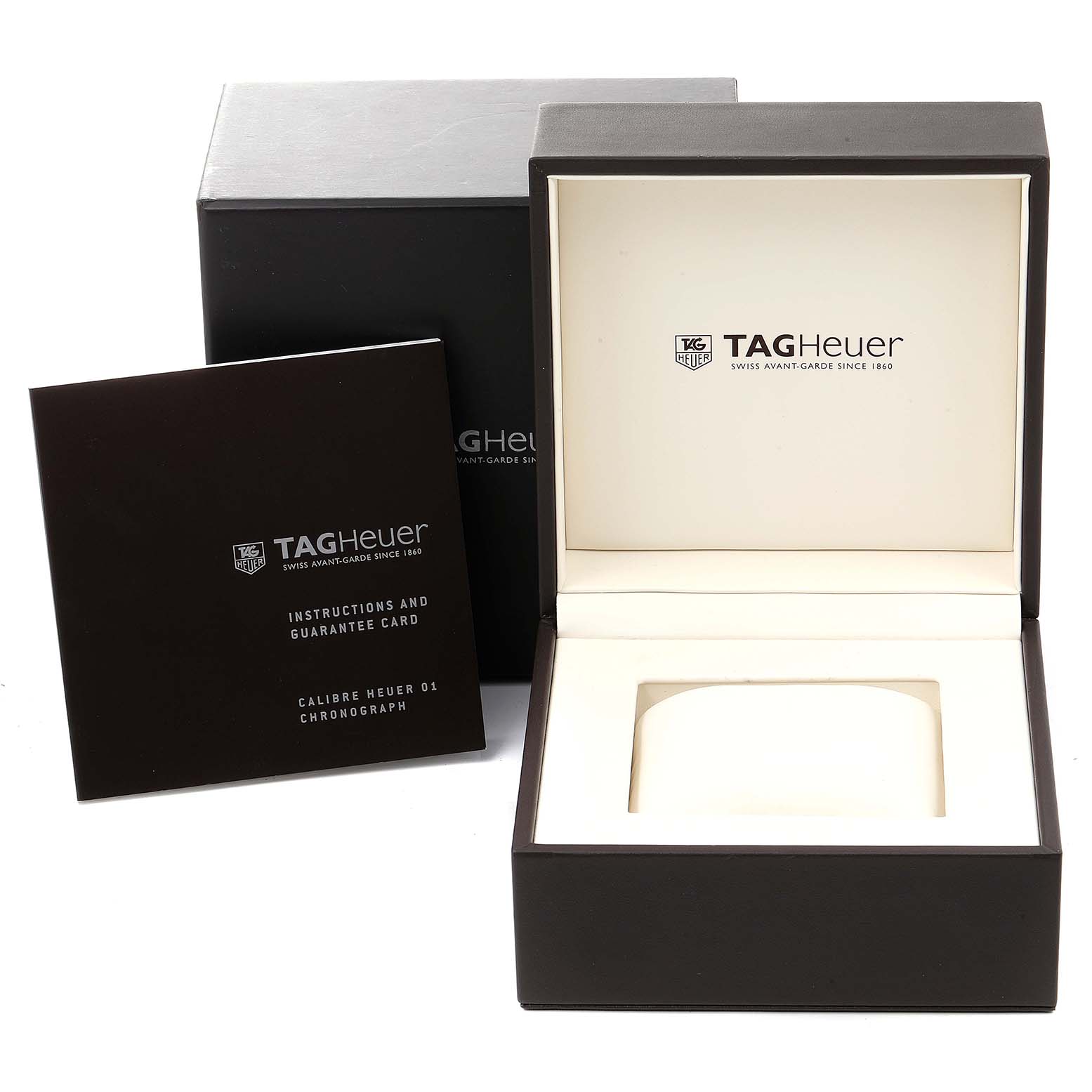 The image shows the box, instructions, and guarantee card for the Tag Heuer Carrera CAR201V.BA0714 Men
s Stainless Steel Black Dial CAR201V.BA0714 Men
s Stainless Steel Black Dial watch.