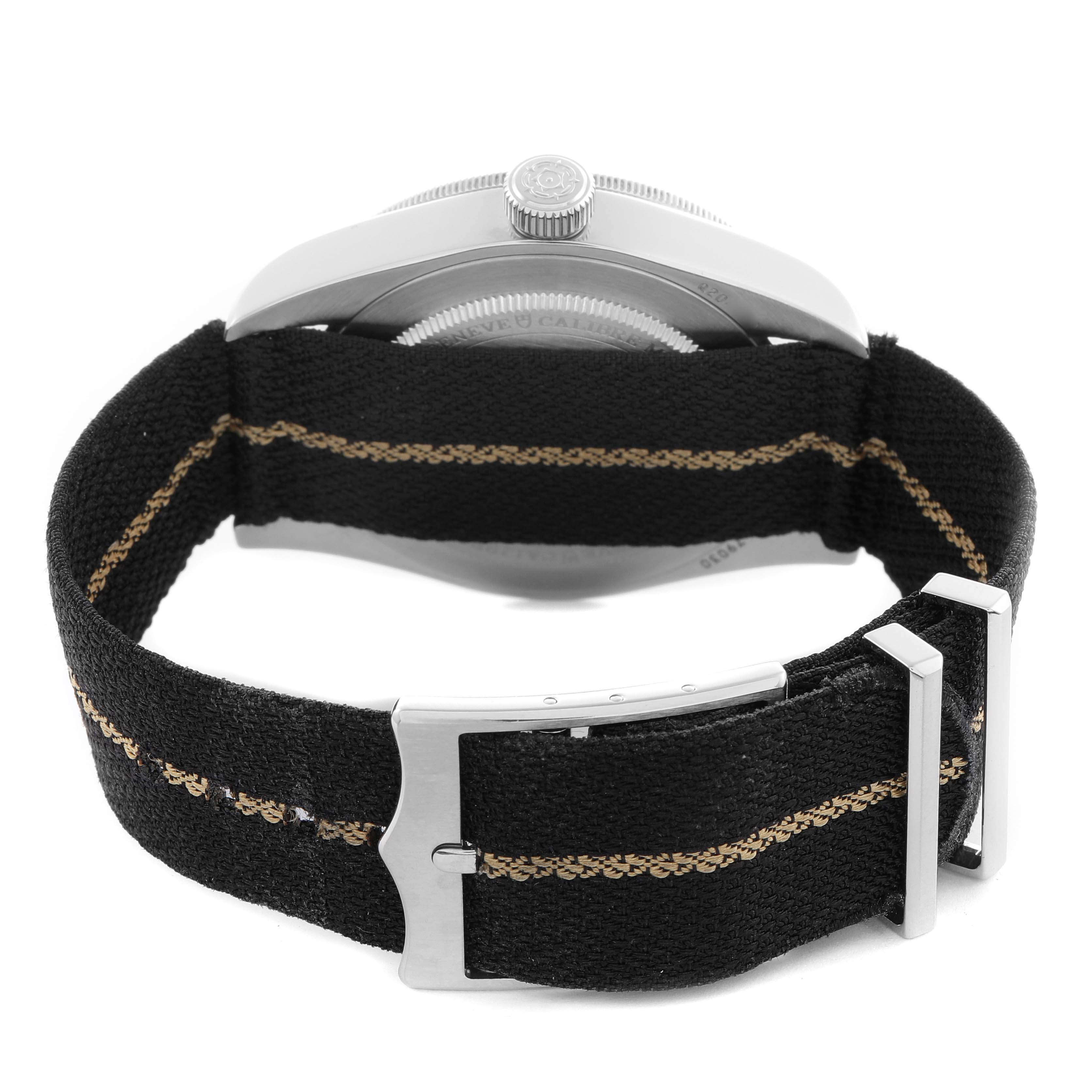 The Heritage Black Bay by Tudor is shown from the back, highlighting the strap and side, including the crown and case back.