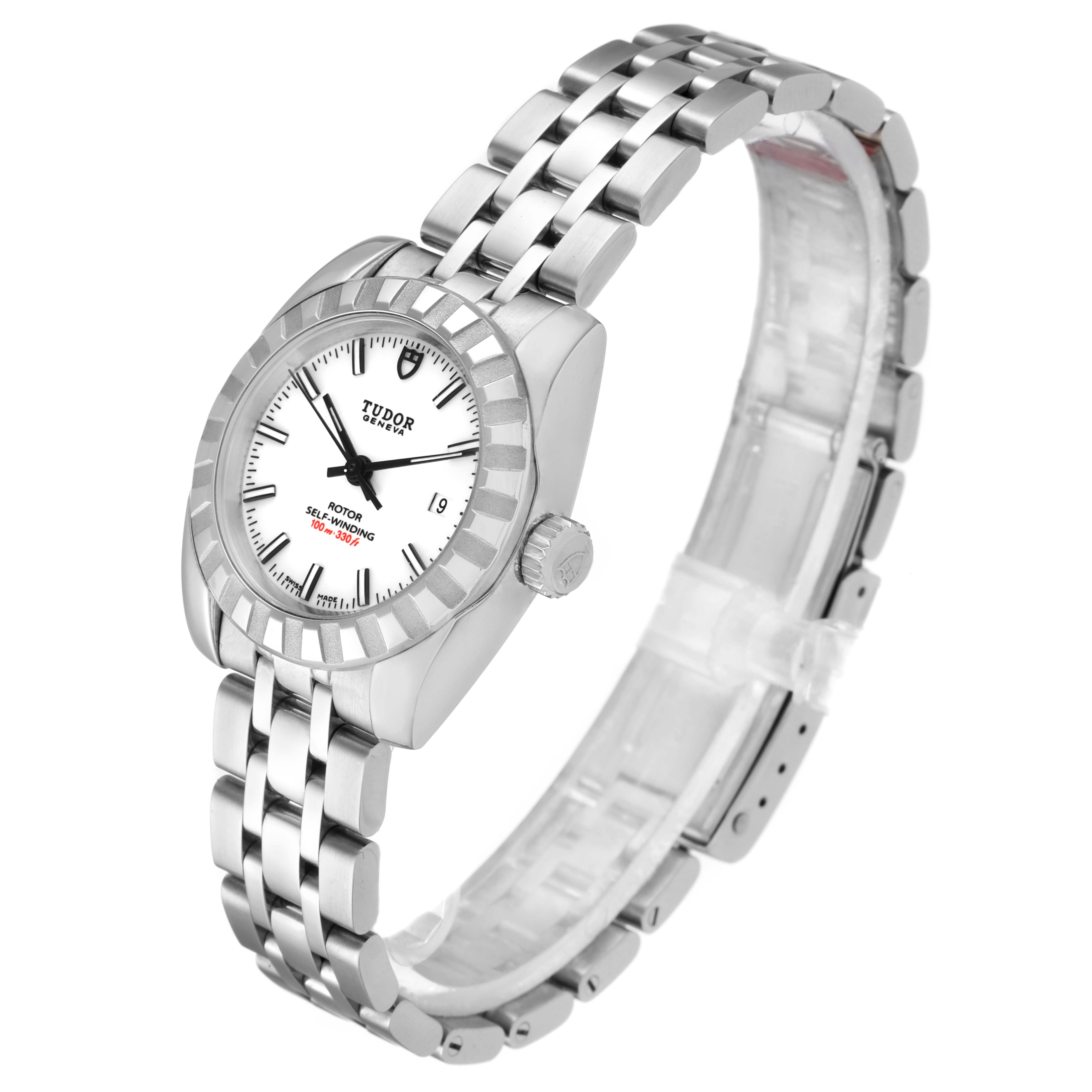 The image shows a Tudor Classic 22010 Women
s Stainless Steel White Dial 22010 Women
s Stainless Steel White Dial model watch from a three-quarter angle, highlighting its face, bracelet, and crown.