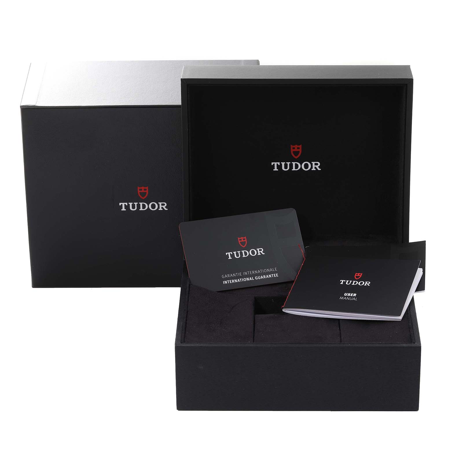 The image shows the Tudor Heritage Black Bay 79830RB Men's Stainless Steel Silver Dial 79830RB Men's Stainless Steel Silver Dial watch box, warranty card, and user manual from a front angle.