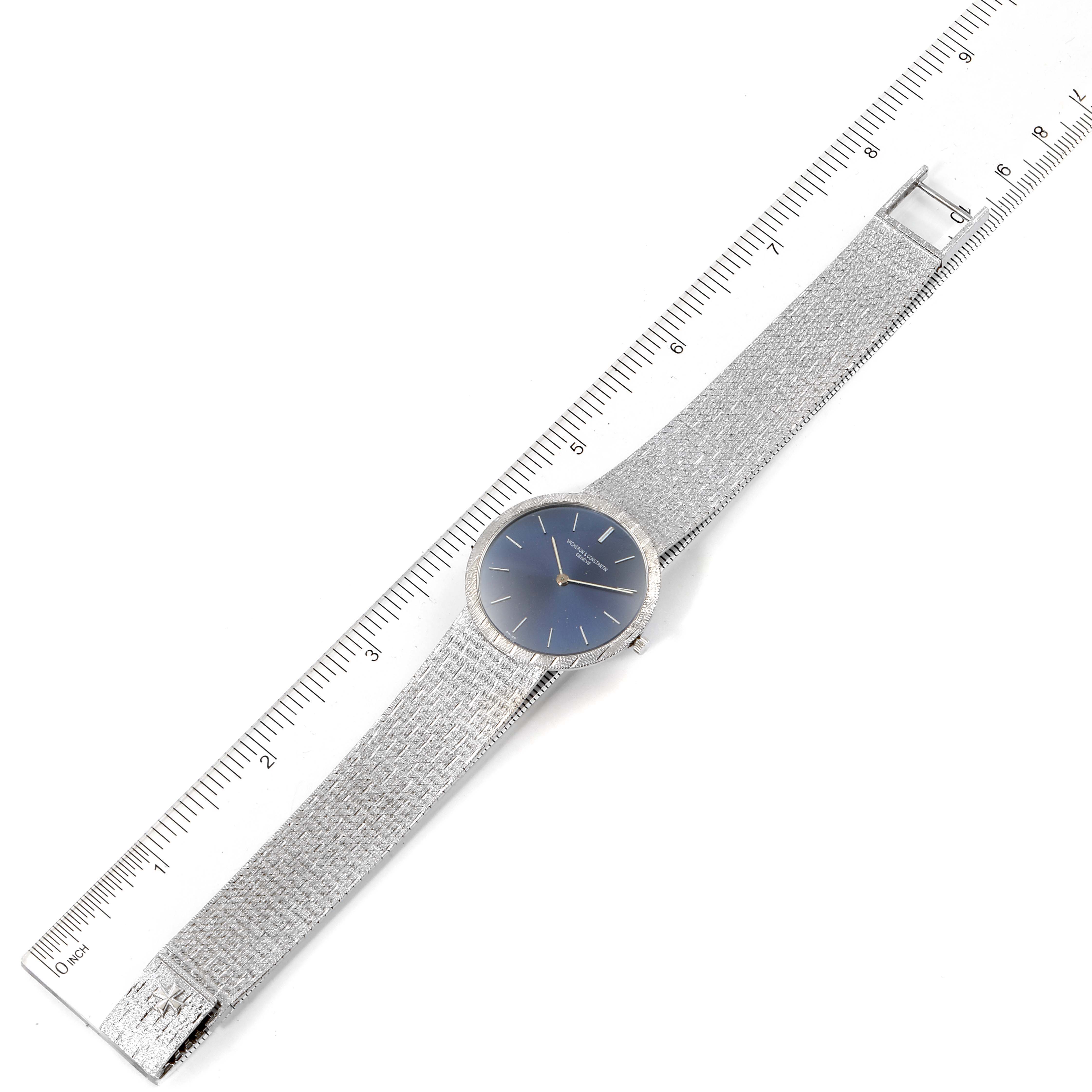 The image shows a top-down view of the Vacheron Constantin Patrimony 6352 Men's White Gold Blue Dial 6352 Men's White Gold Blue Dial watch, alongside a measuring ruler.