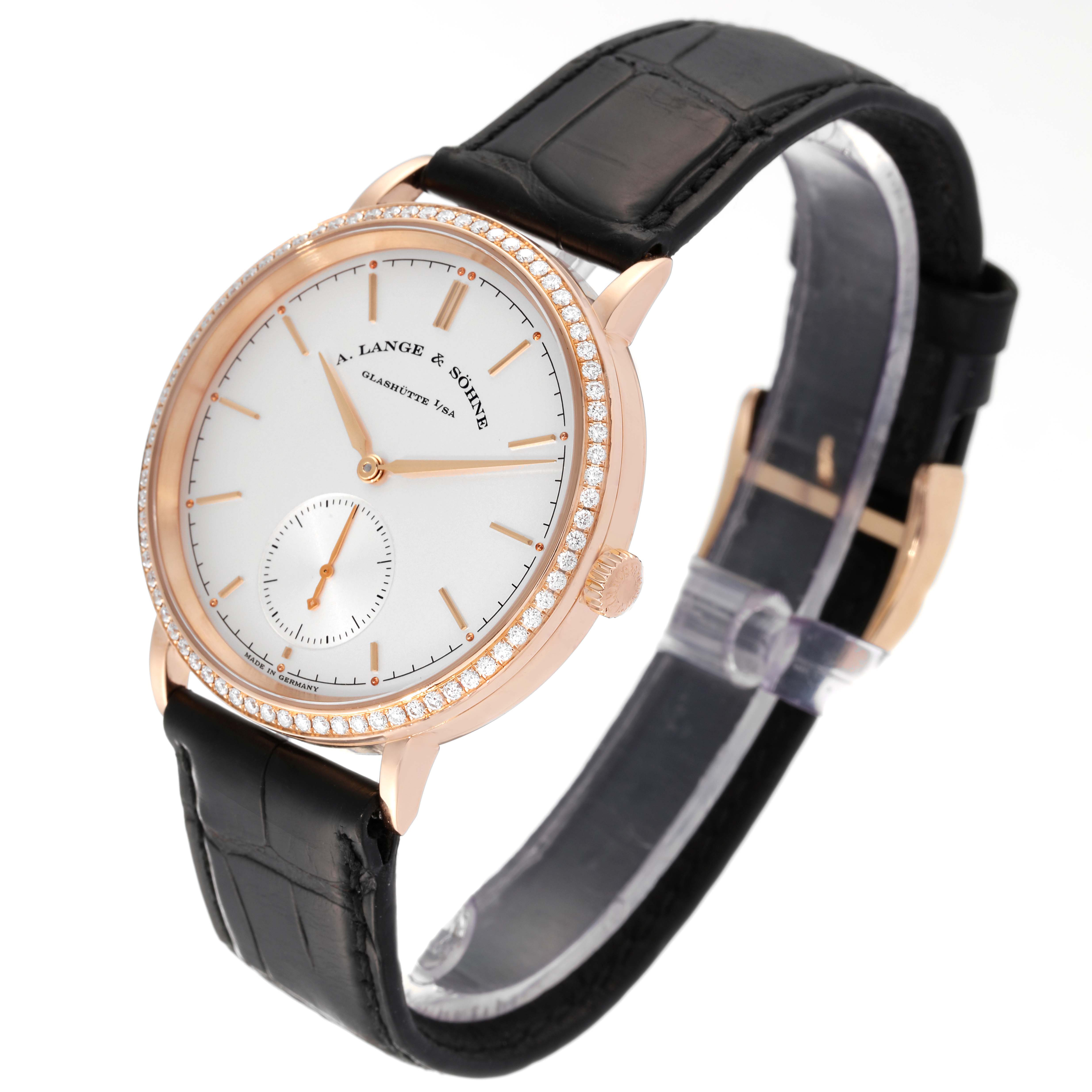 The A. Lange & Sohne Saxonia 842.032 Men's Rose Gold Silver Dial watch is shown at a slight angle, displaying its face, bezel, crown, and leather strap.