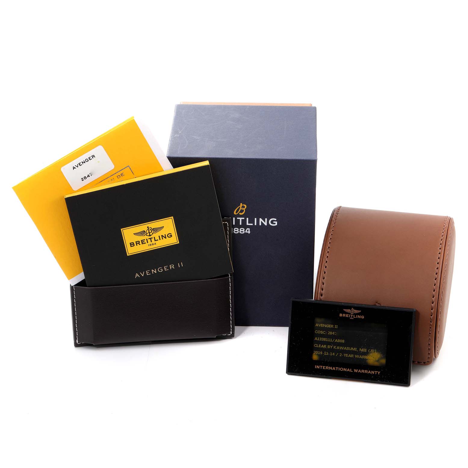 The image shows the packaging and accessories for the Breitling Avenger A13381 Men's Stainless Steel Mother of Pearl Dial A13381 Men's Stainless Steel Mother of Pearl Dial model, including manuals, warranty card, box, and leather pouch.