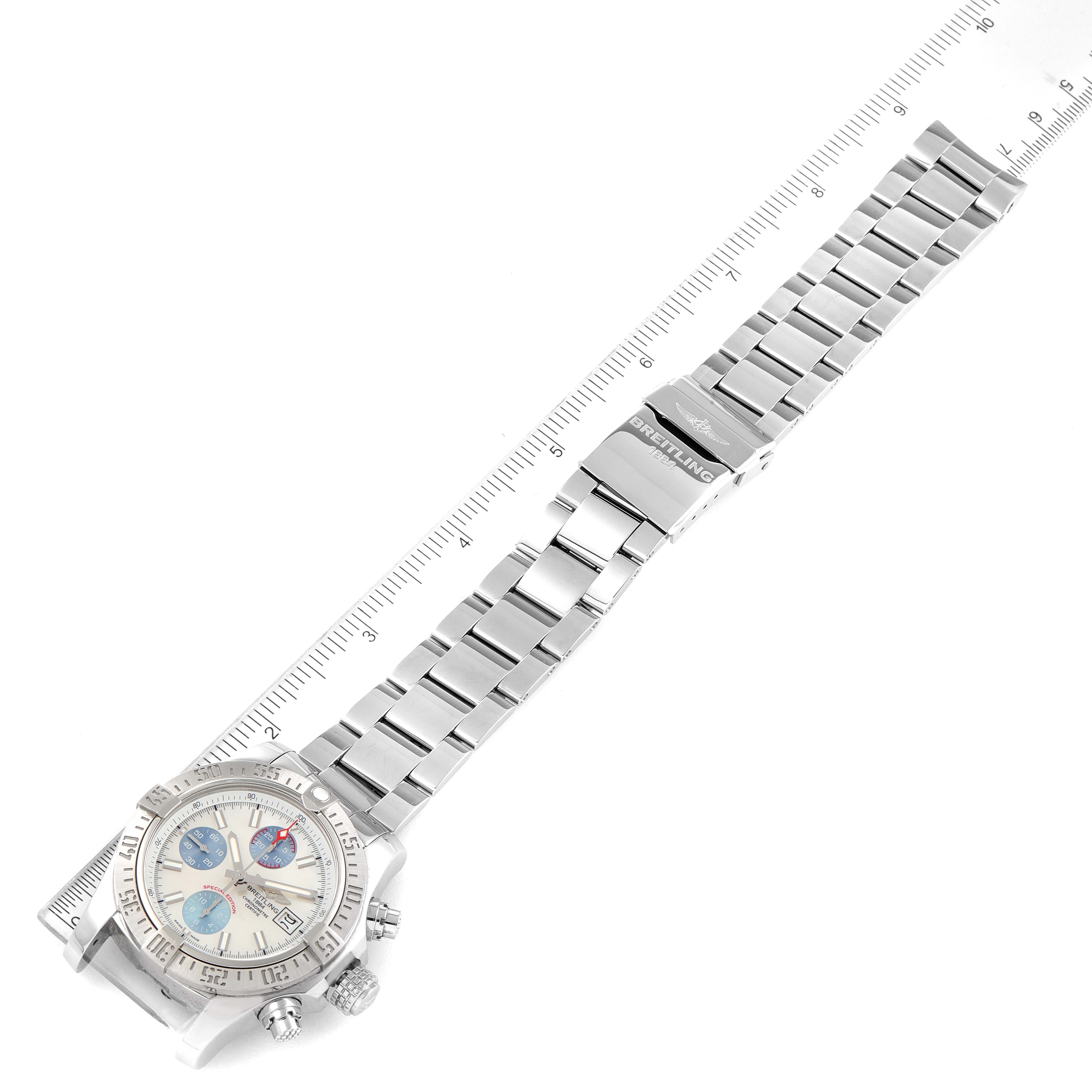 This image shows an angled view of the Breitling Avenger A13381 Men's Stainless Steel Mother of Pearl Dial A13381 Men's Stainless Steel Mother of Pearl Dial watch, highlighting its face, bezel, and metal bracelet with a clasp.