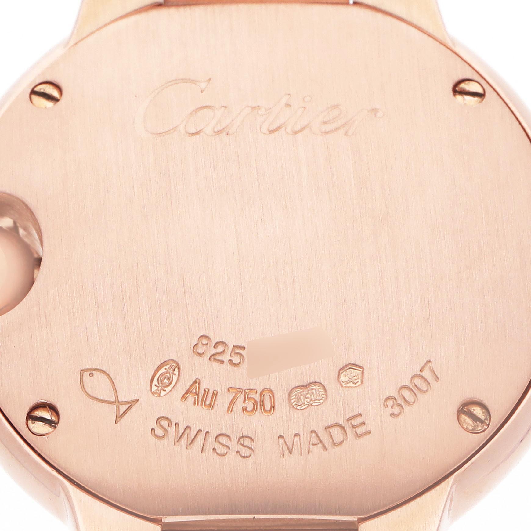 The image shows the back case of a Cartier Ballon Bleu W69002Z2 Women
s Rose Gold White Dial W69002Z2 Women
s Rose Gold White Dial watch, highlighting its engravings and material details.