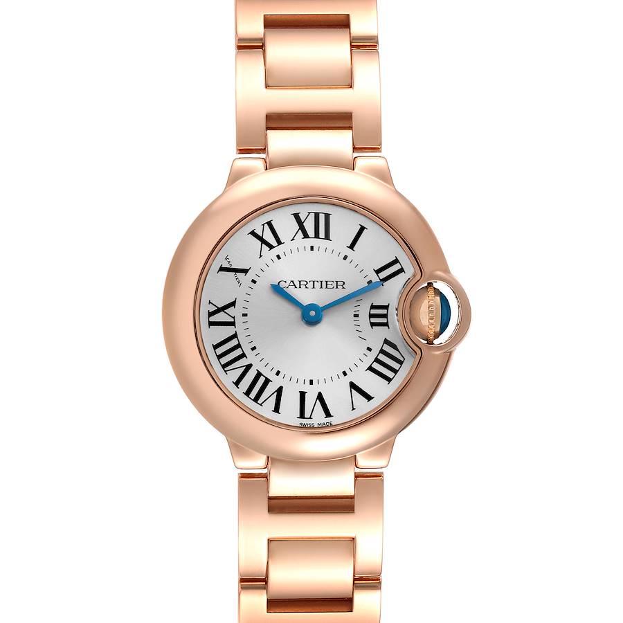 The Cartier Ballon Bleu watch is shown from a top-down angle, highlighting its round case, Roman numerals, and bracelet.