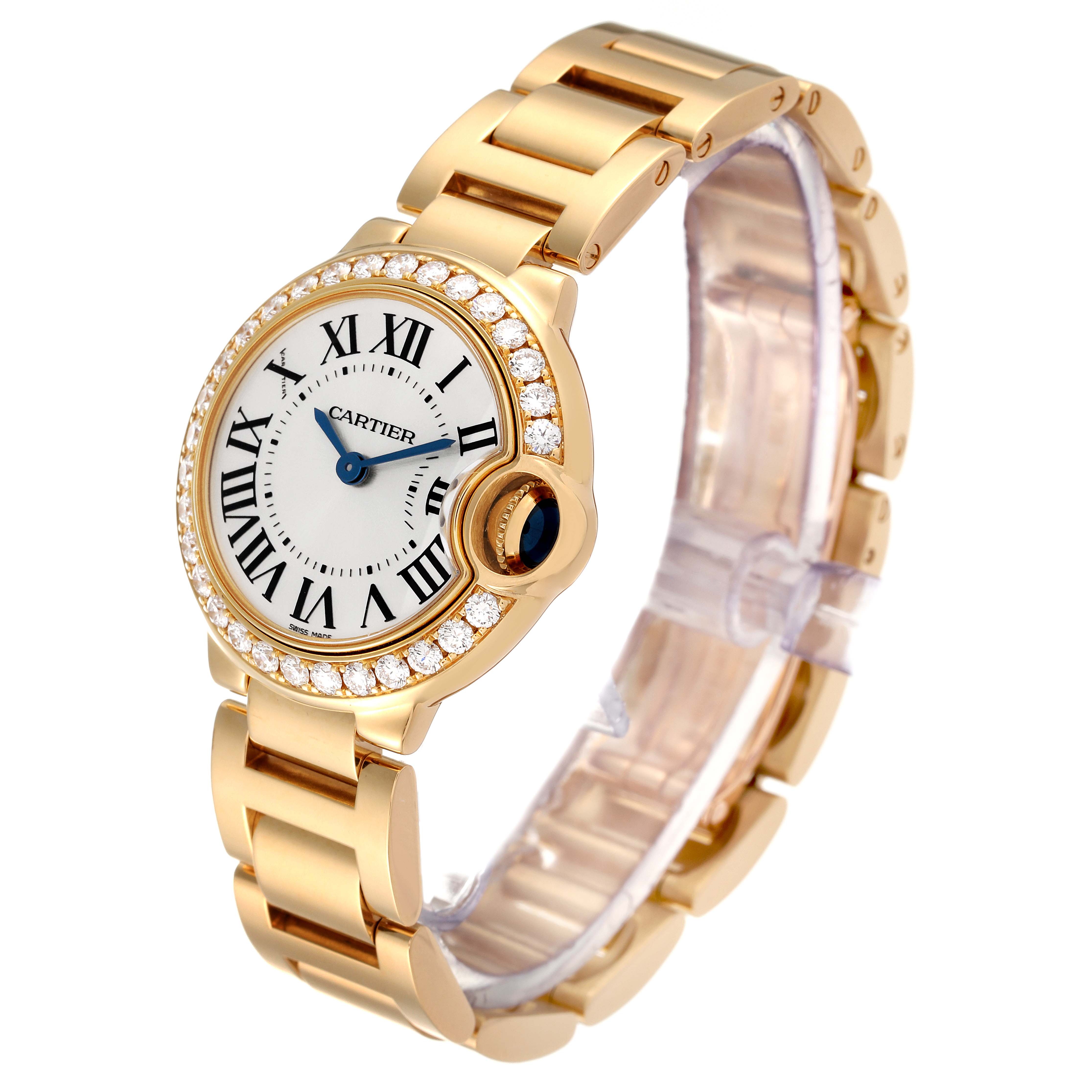 The image shows a Cartier Ballon Bleu WE9001Z3 Women's Yellow Gold Silver Dial WE9001Z3 Women's Yellow Gold Silver Dial watch at a three-quarter angle, highlighting the dial, bezel, crown, and bracelet.