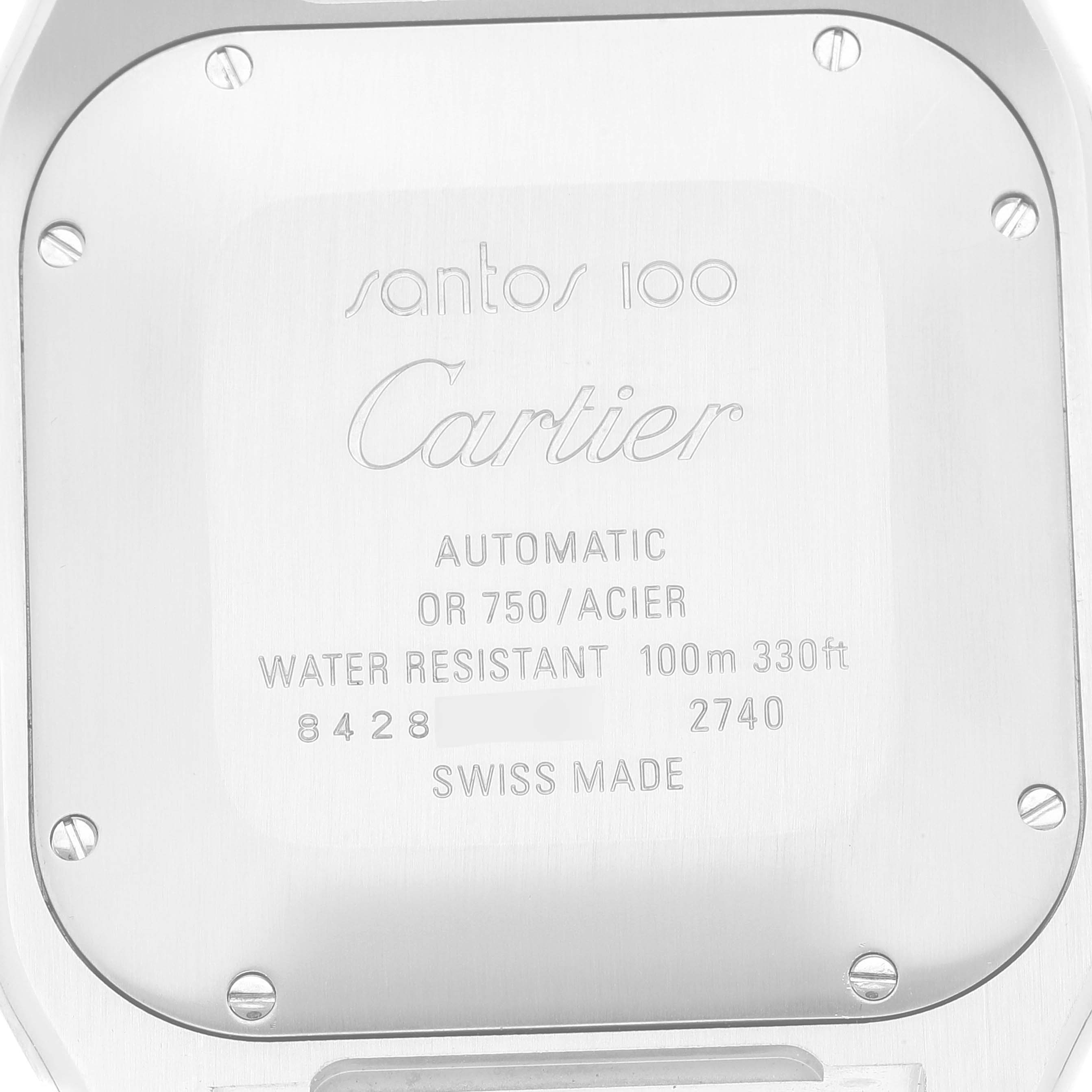 The image shows the case back of a Santos model by Cartier, displaying its engravings and screws.