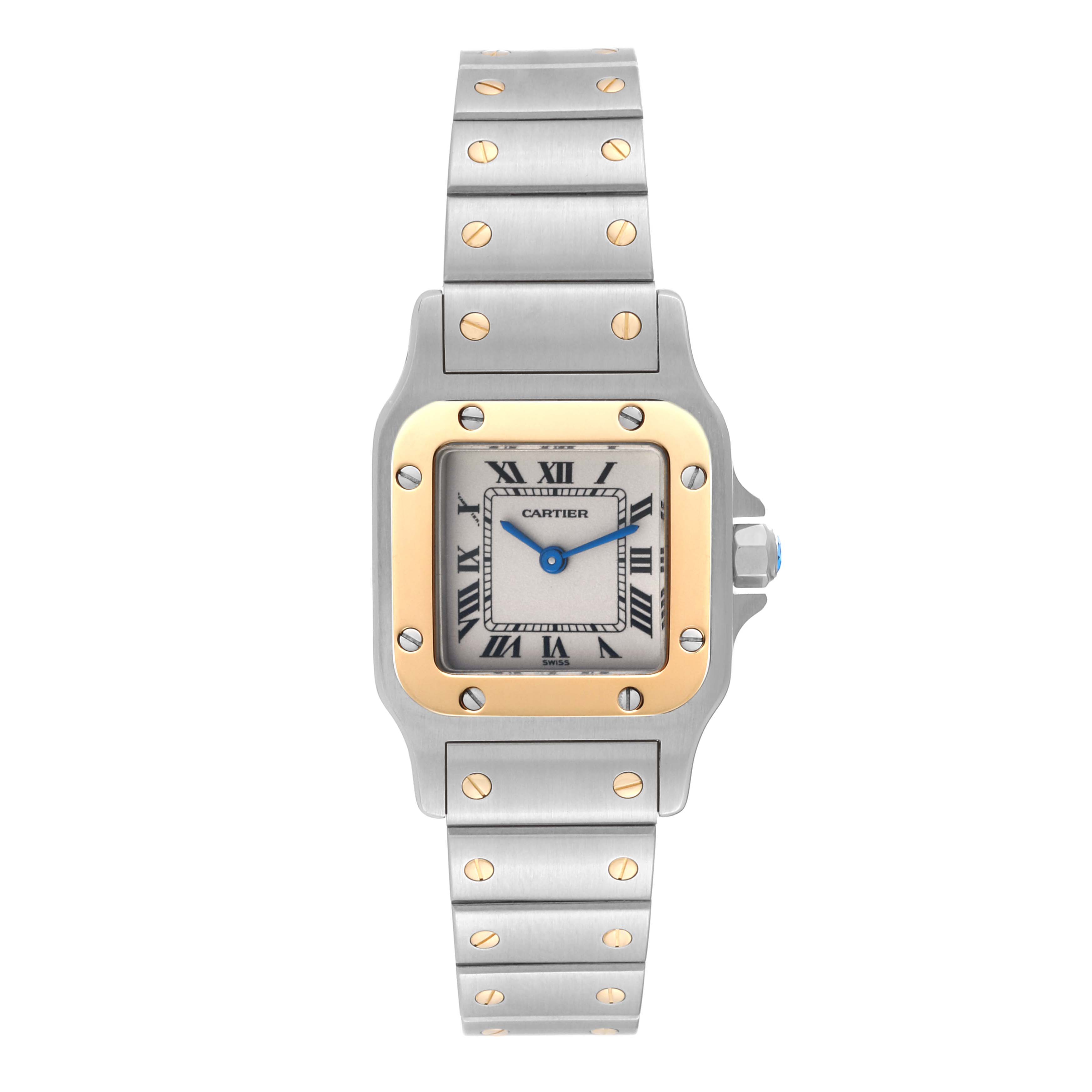 This image shows a frontal view of a Cartier Santos W20012C4 Women's Steel and Gold (two tone) Silver Dial W20012C4 Women's Steel and Gold (two tone) Silver Dial watch, featuring the face, bezel, and the bracelet.
