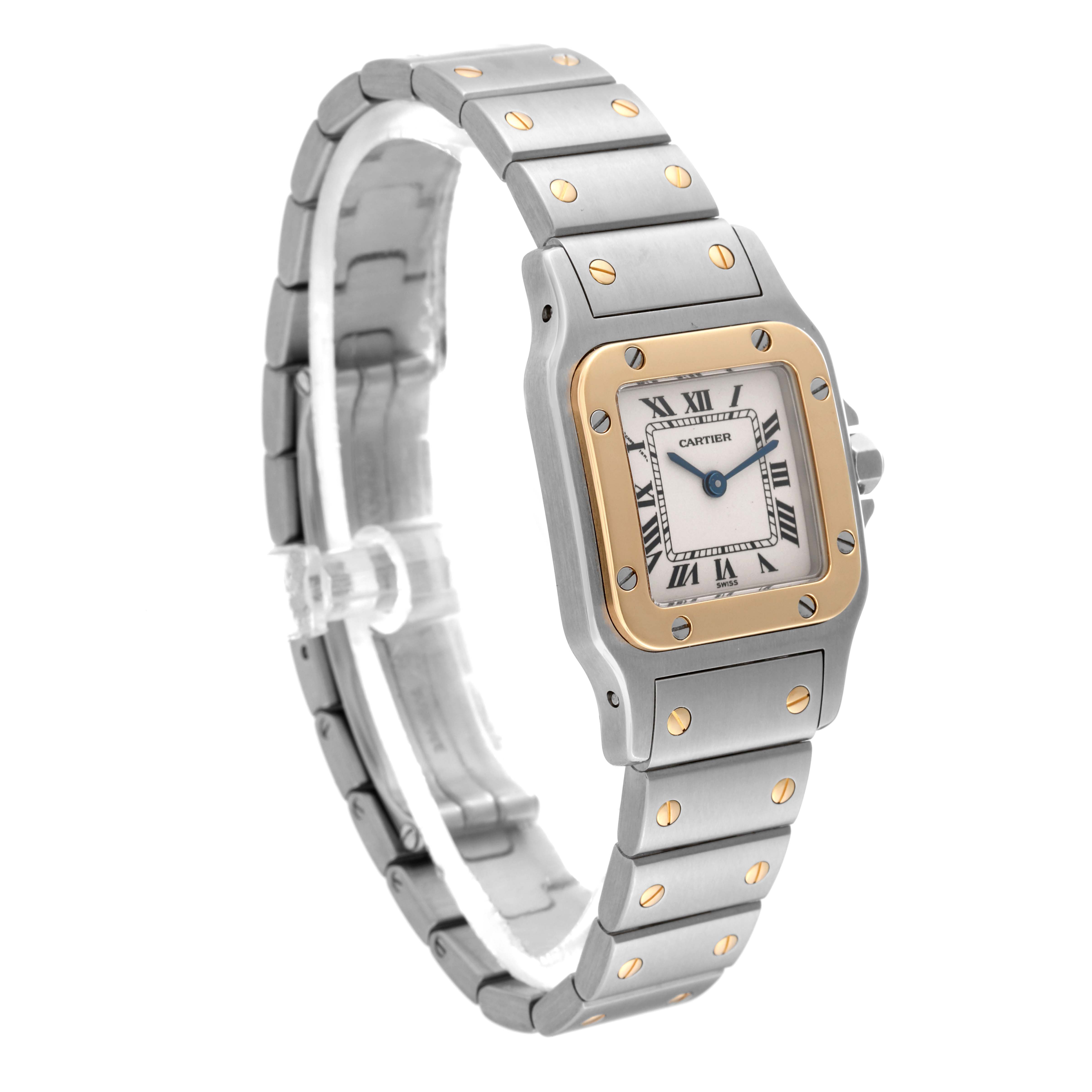 The Cartier Santos W20012C4 Women's Steel and Gold (two tone) Silver Dial W20012C4 Women's Steel and Gold (two tone) Silver Dial watch is shown at a slight angle, highlighting its bracelet with gold screws and its square face with a gold bezel.