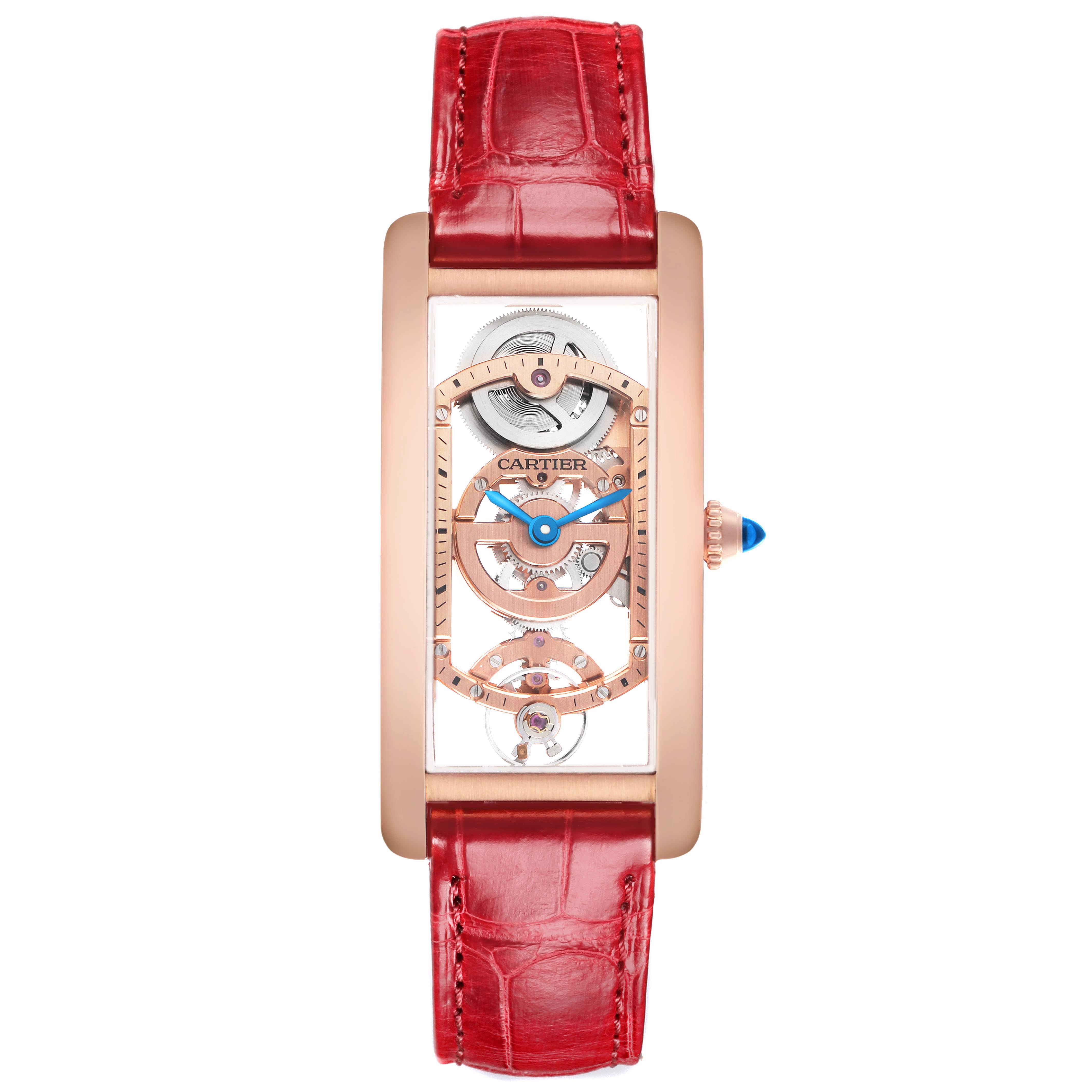 The Cartier Tank Cintree WHTA0008 Men's Rose Gold Transparent Dial watch is shown from a top view, highlighting its rectangular case, red strap, and exposed mechanics.