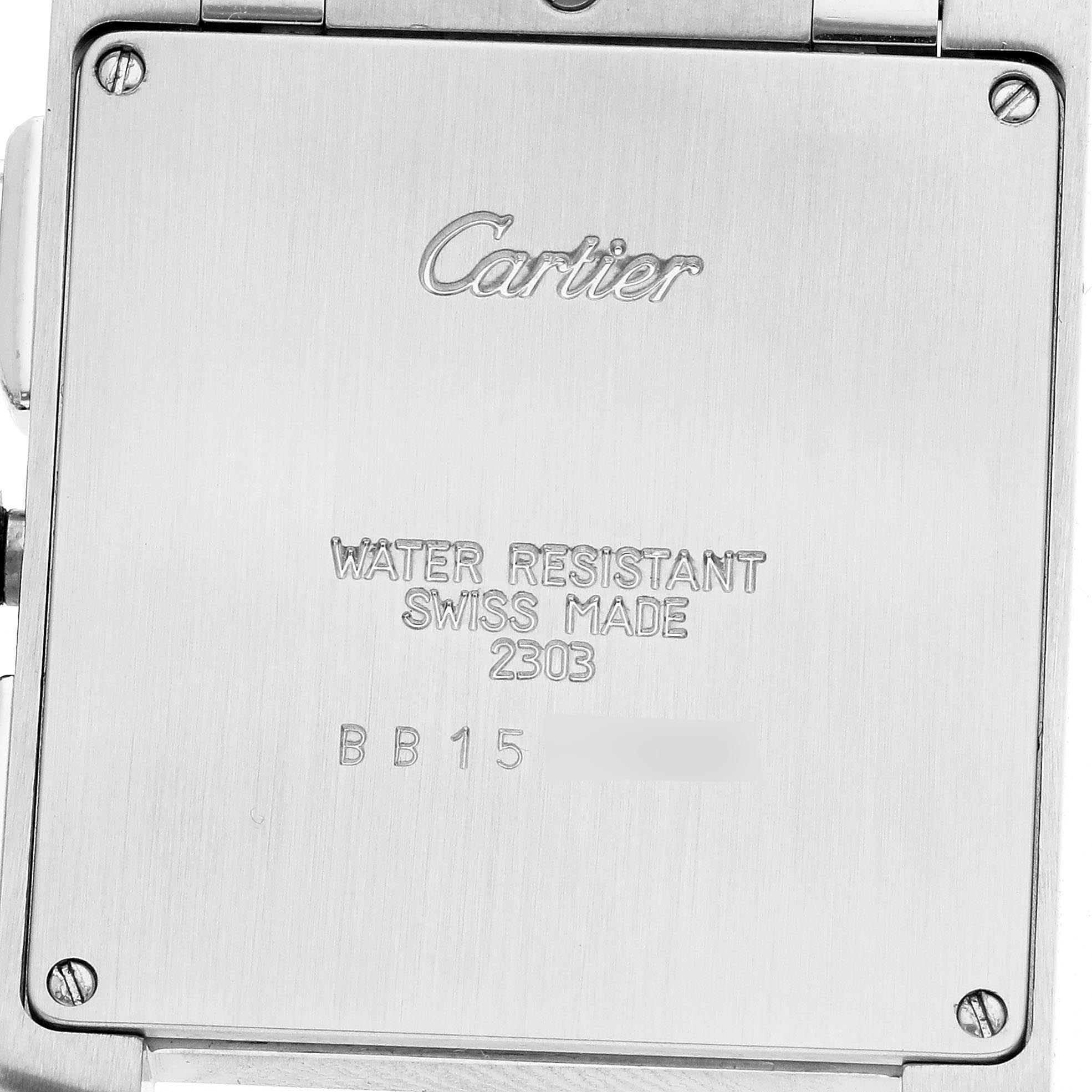 The image shows the back of the Cartier Tank Francaise W51001Q3 Men's Stainless Steel Silver Dial W51001Q3 Men's Stainless Steel Silver Dial watch, displaying engraved details and screws at the corners.