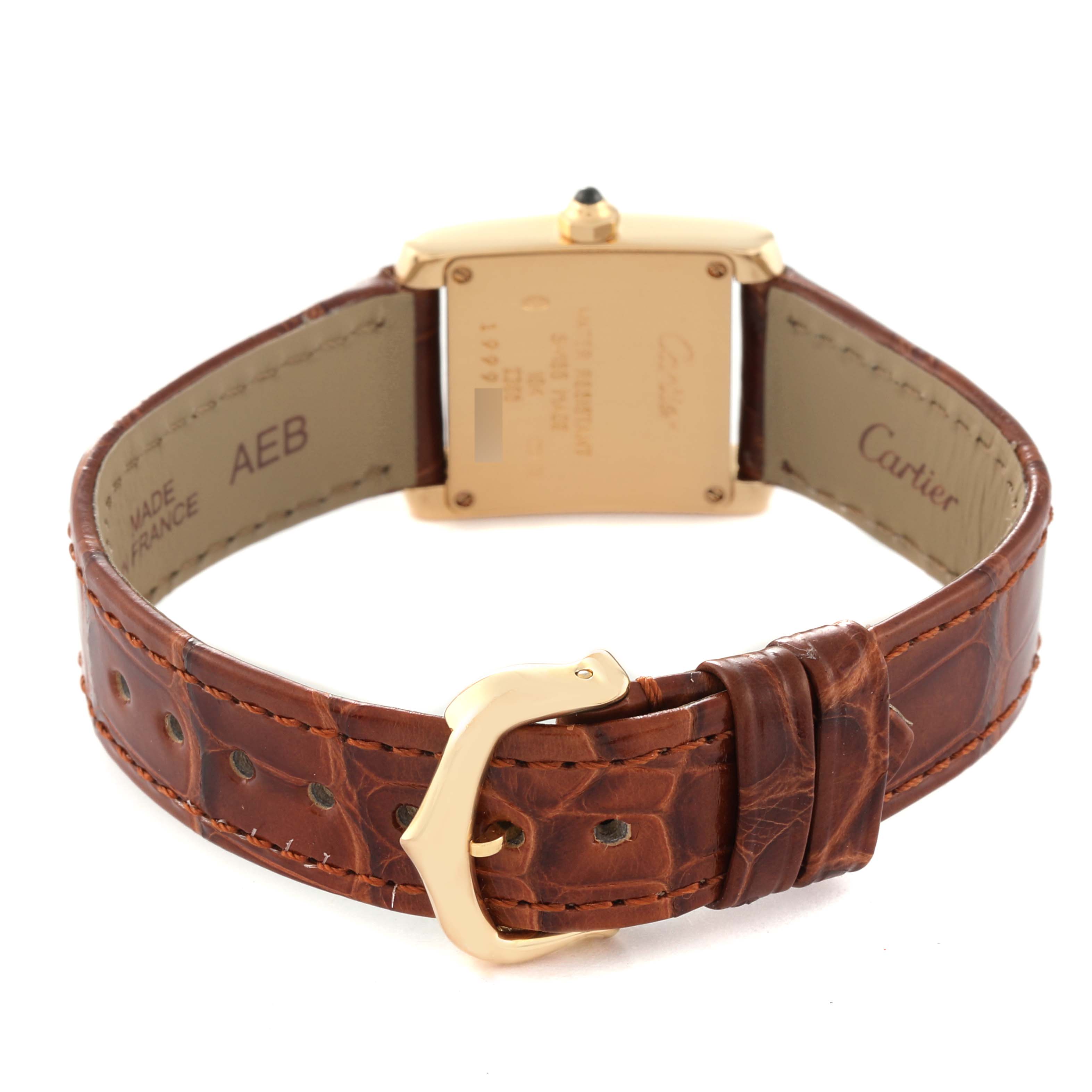 The image shows the back, clasp, and strap of the Cartier Tank Française watch.