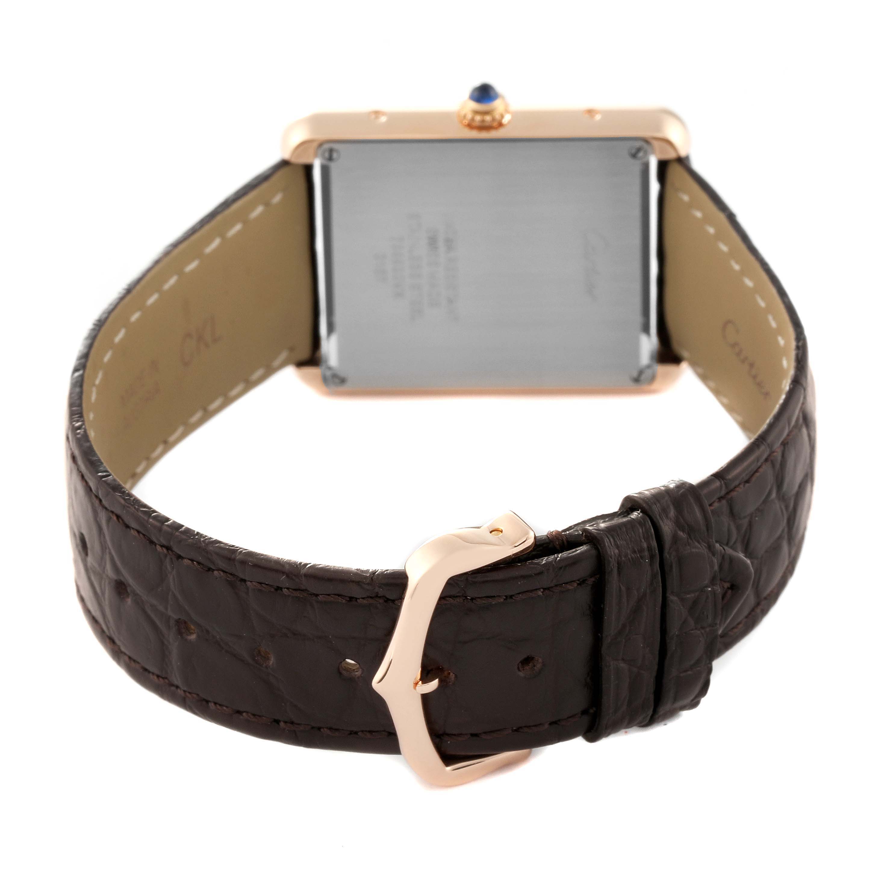 The image shows the back view of a Cartier Tank Solo W5200025 Men
s Steel and Gold (two tone) Silver Dial W5200025 Men
s Steel and Gold (two tone) Silver Dial watch, displaying the case back, strap, and buckle.