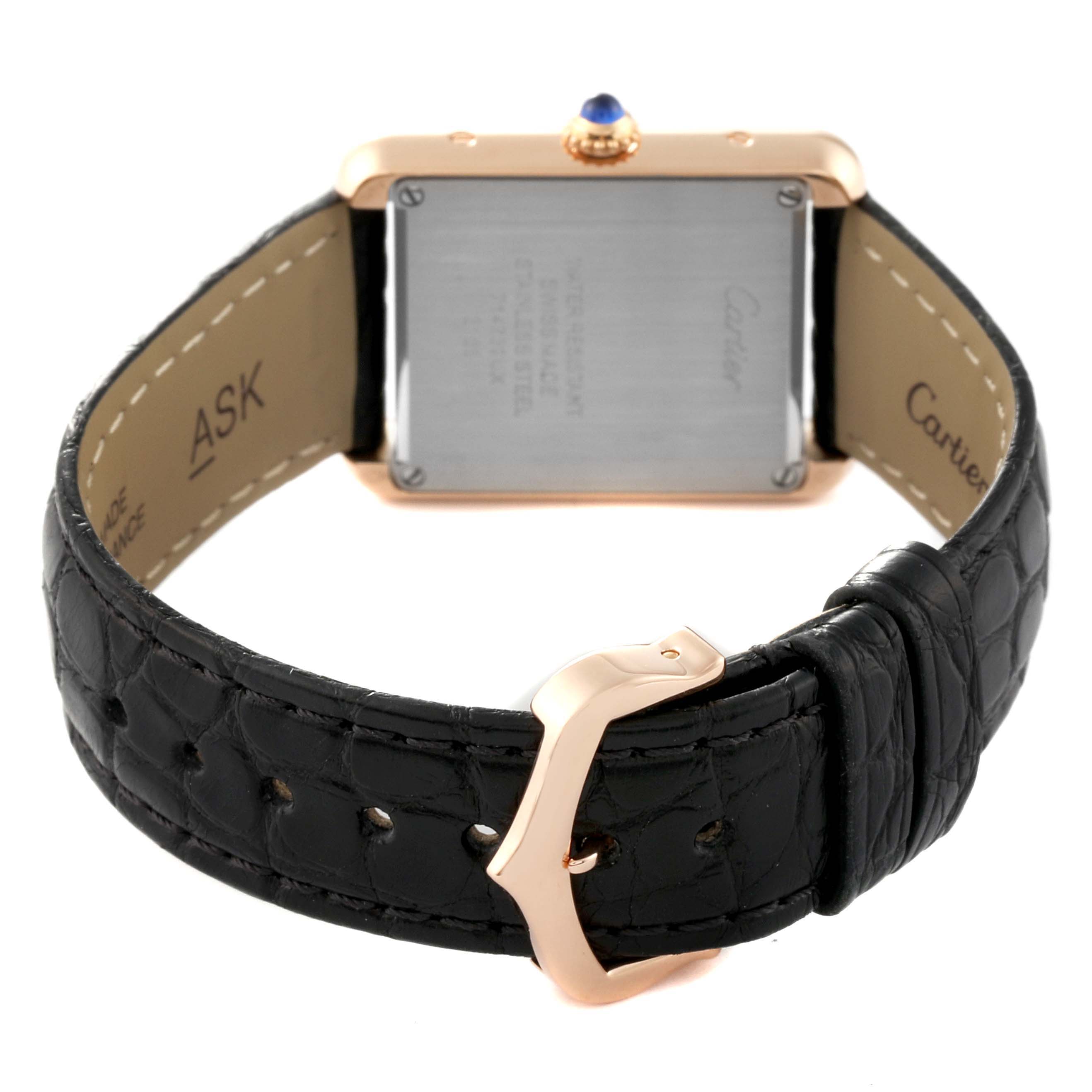 The image shows the back of the Cartier Tank Solo W5200024 Women
s Steel and Gold (two tone) Silver Dial W5200024 Women
s Steel and Gold (two tone) Silver Dial watch, highlighting the clasp and strap.